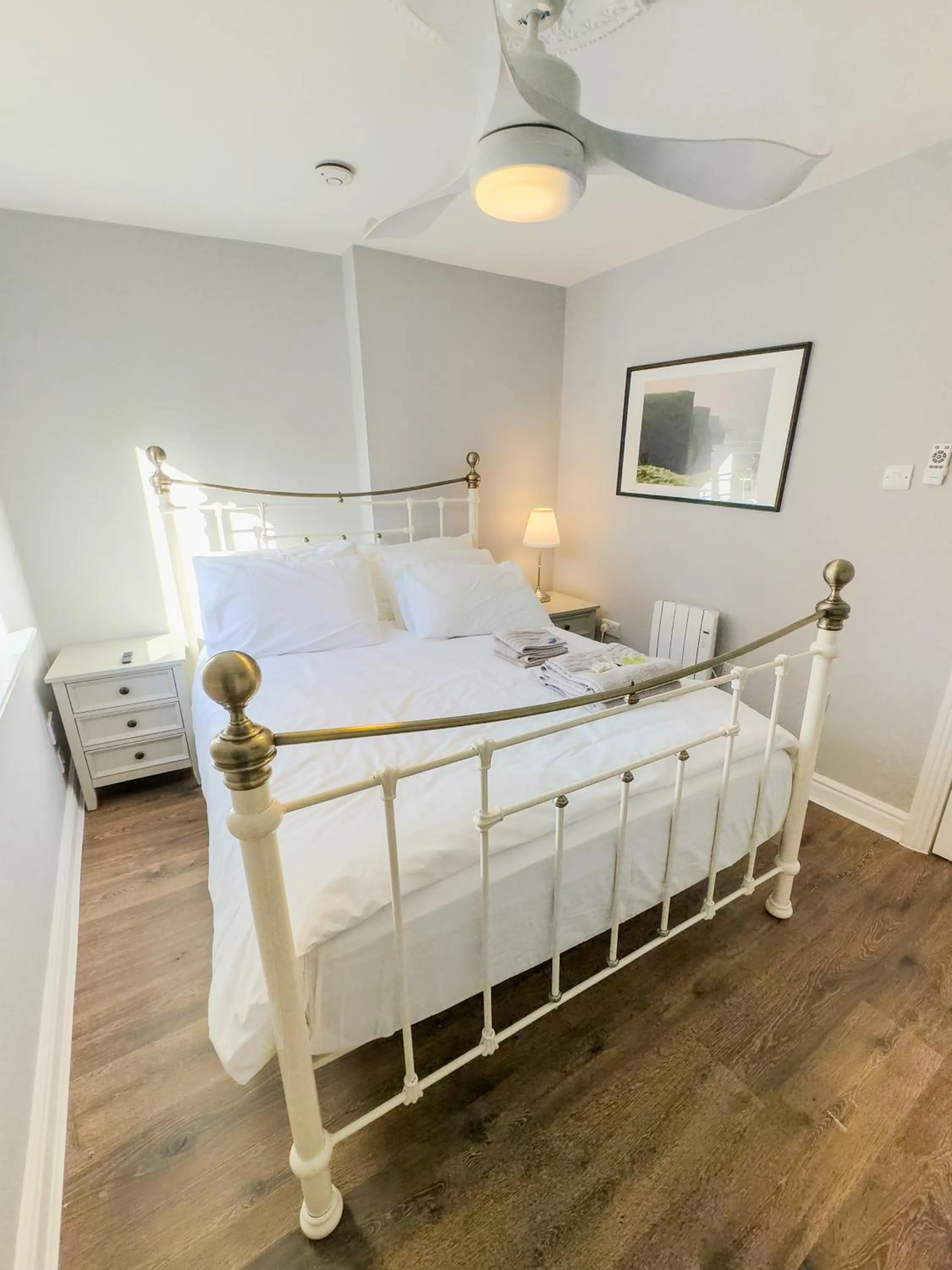 Bed in Molloys Apartments