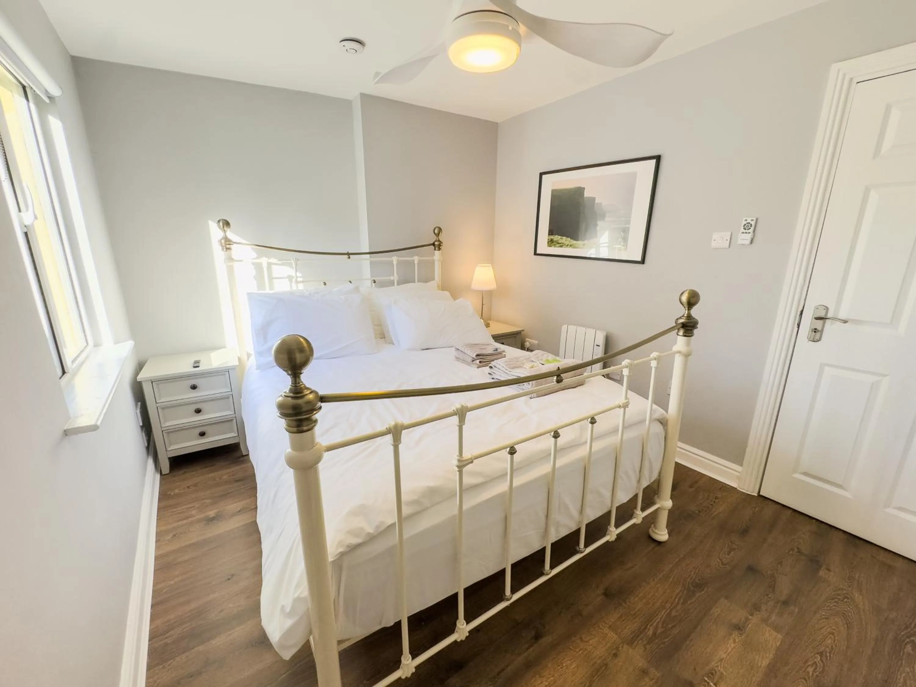 Bed in Molloys Apartments