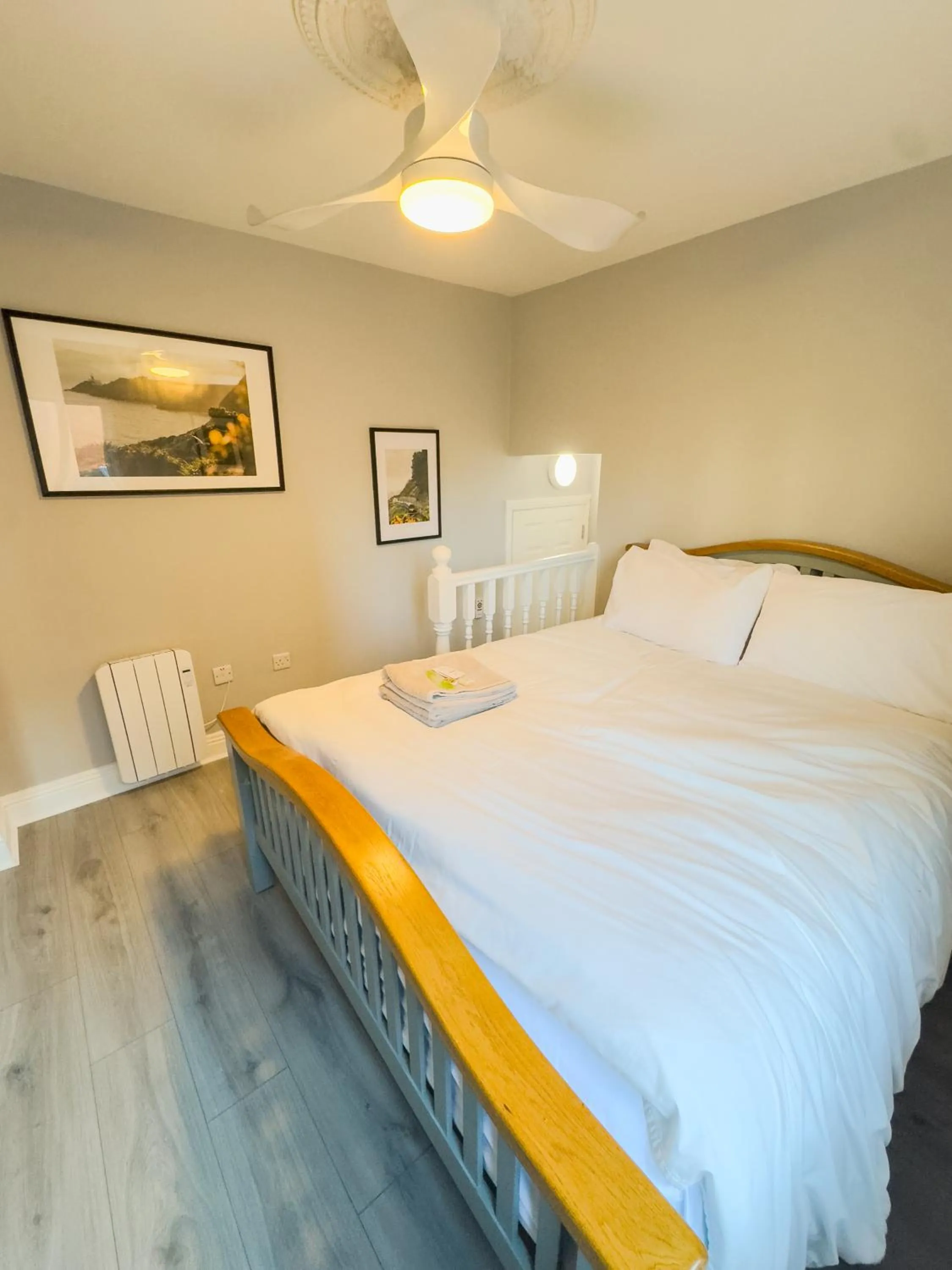 Bed in Molloys Apartments