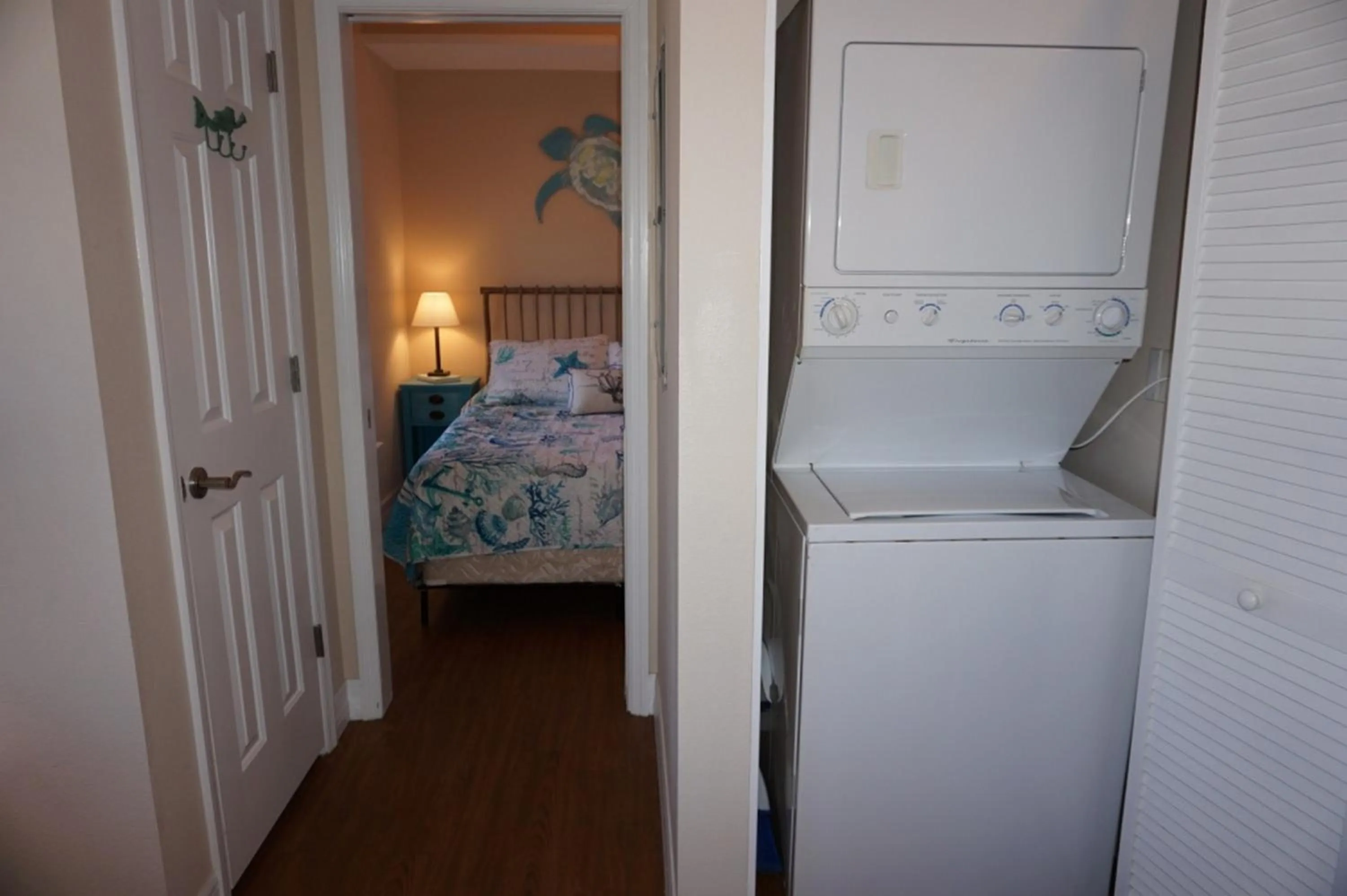 washing machine, Bed in Madeira Bay Resort II by Travel Resort Services