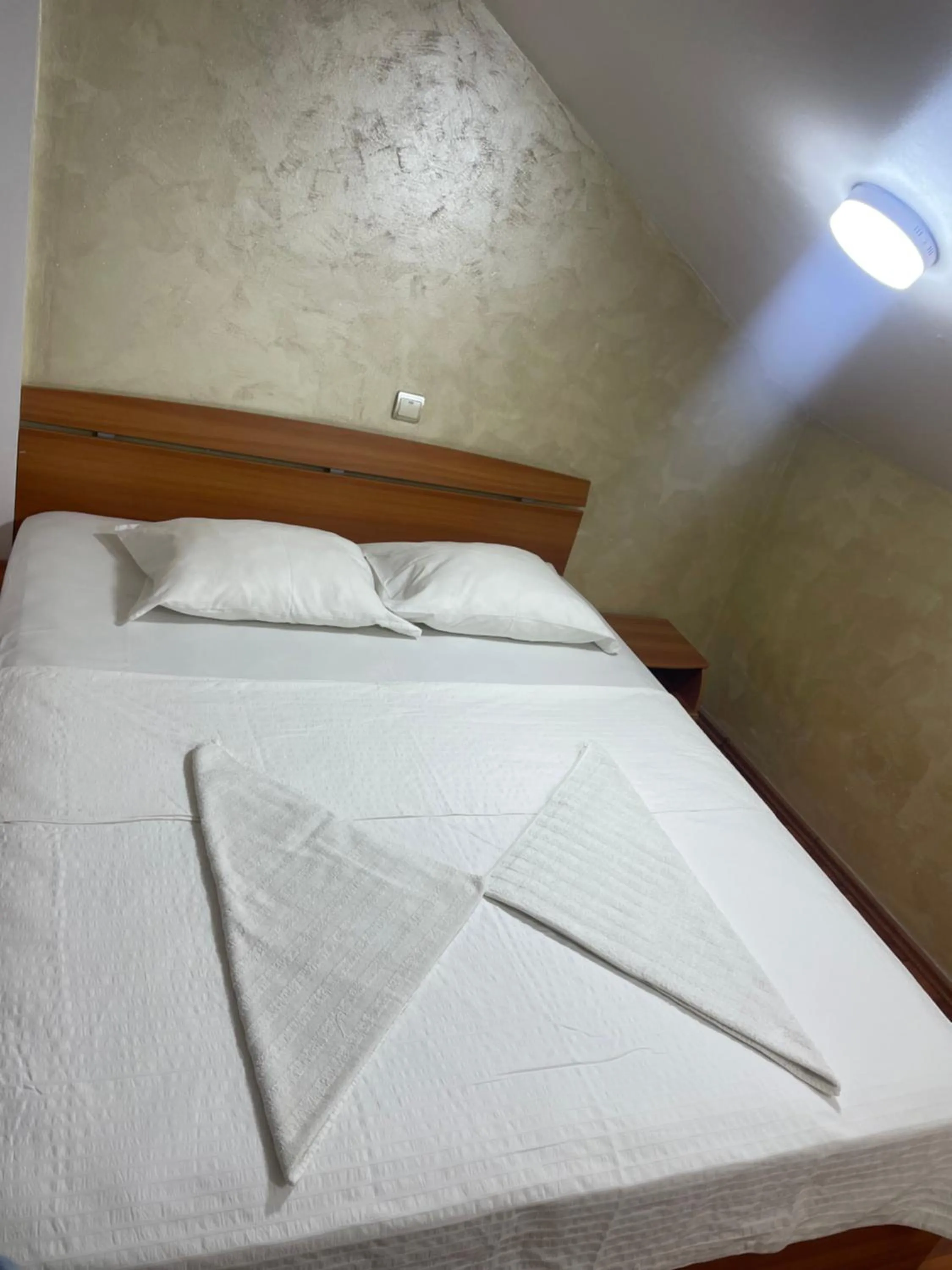 Bedroom in KM 80 Restaurant & Hotel