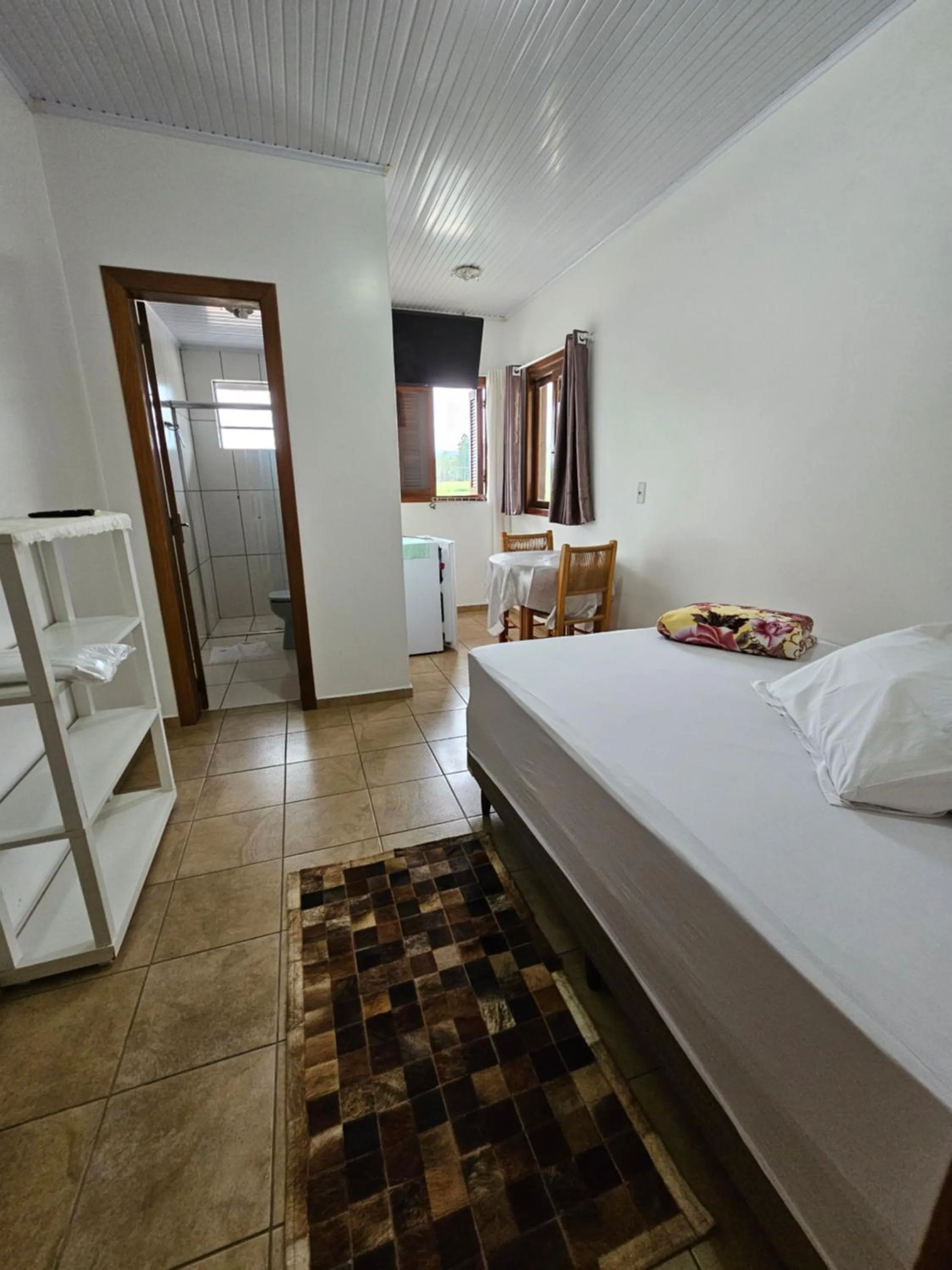 TV and multimedia, Bed in Hotel Pousada Rolantchê