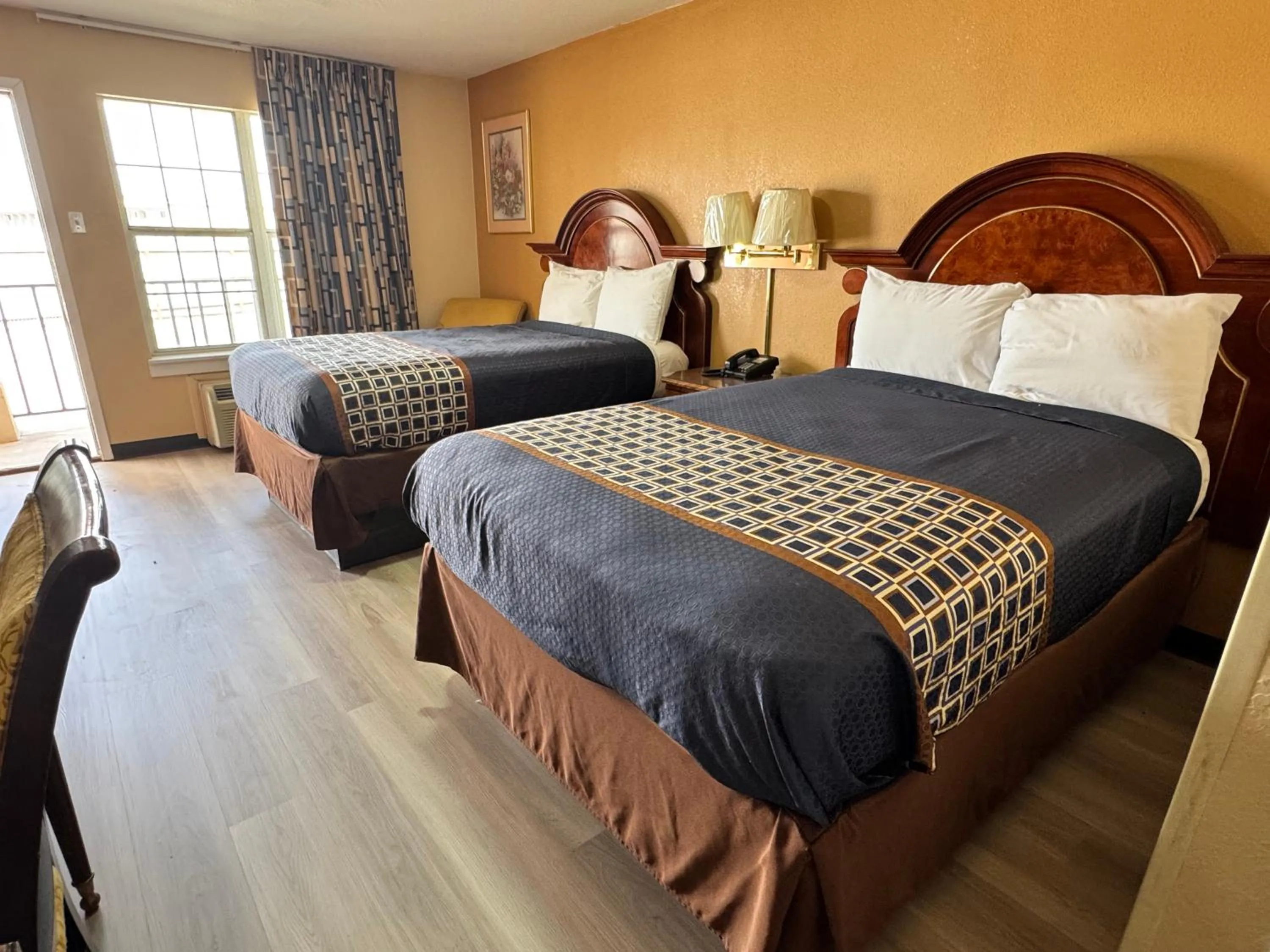 Bed in Villa West Inn