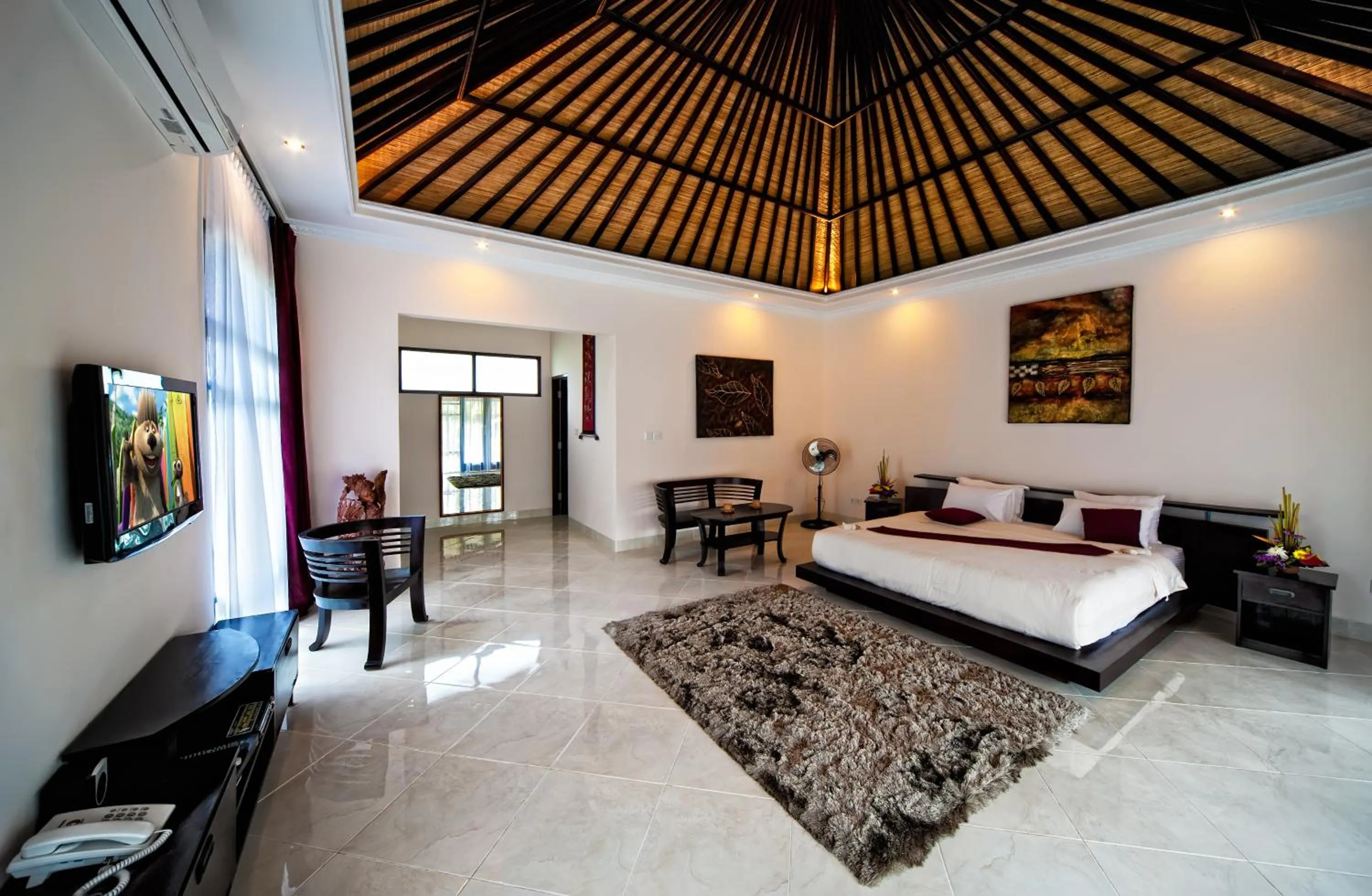 Bed in Rossa Garden Hotel