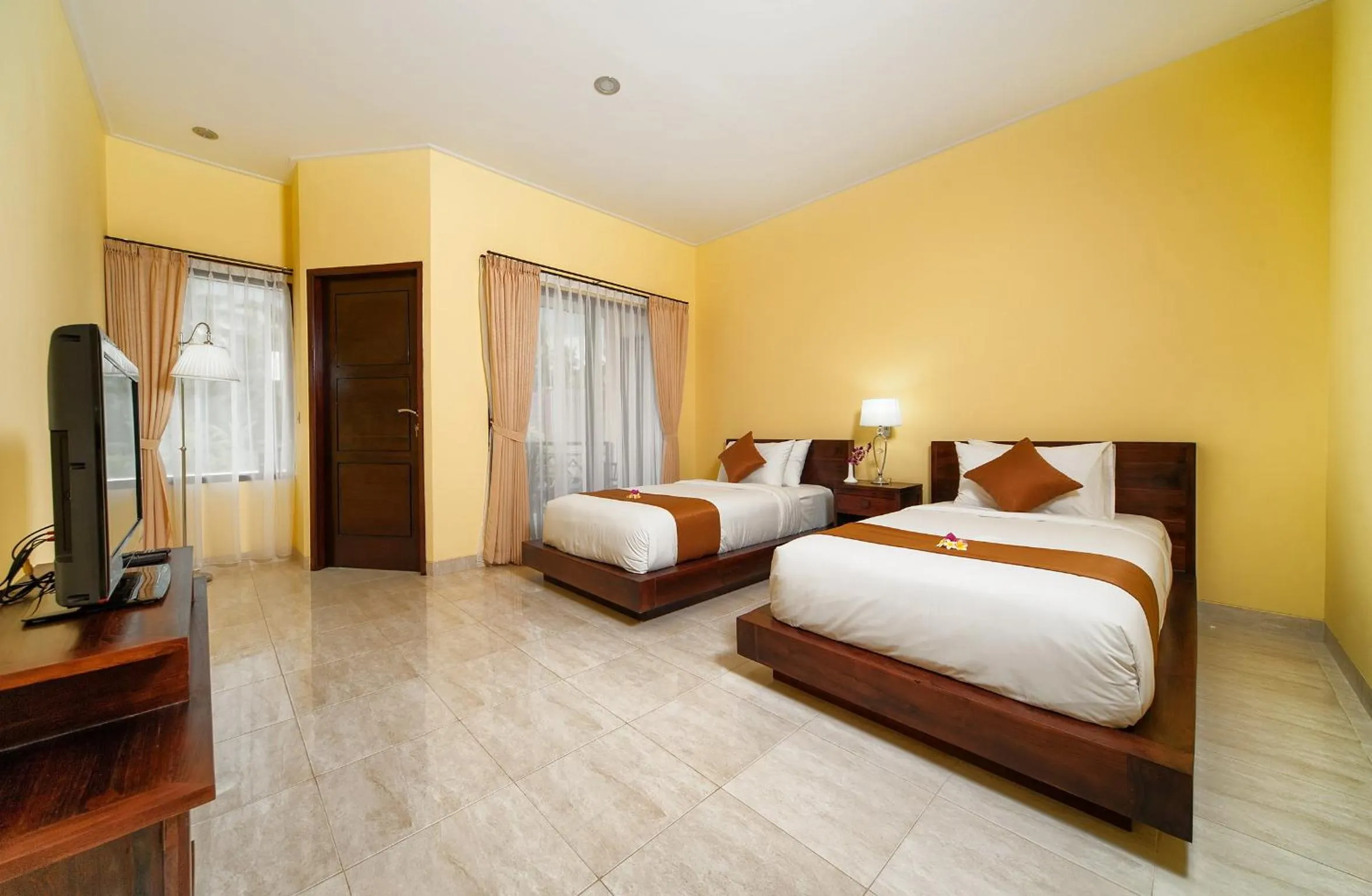 Bed in Rossa Garden Hotel