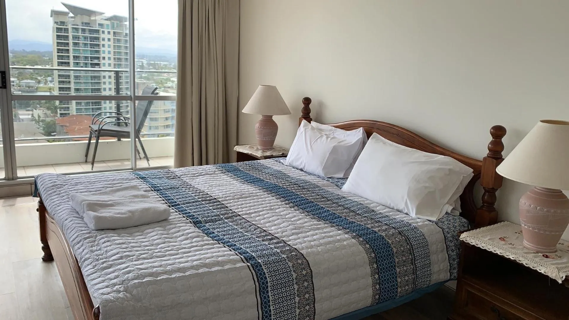 Bed in The Penthouses Apartments