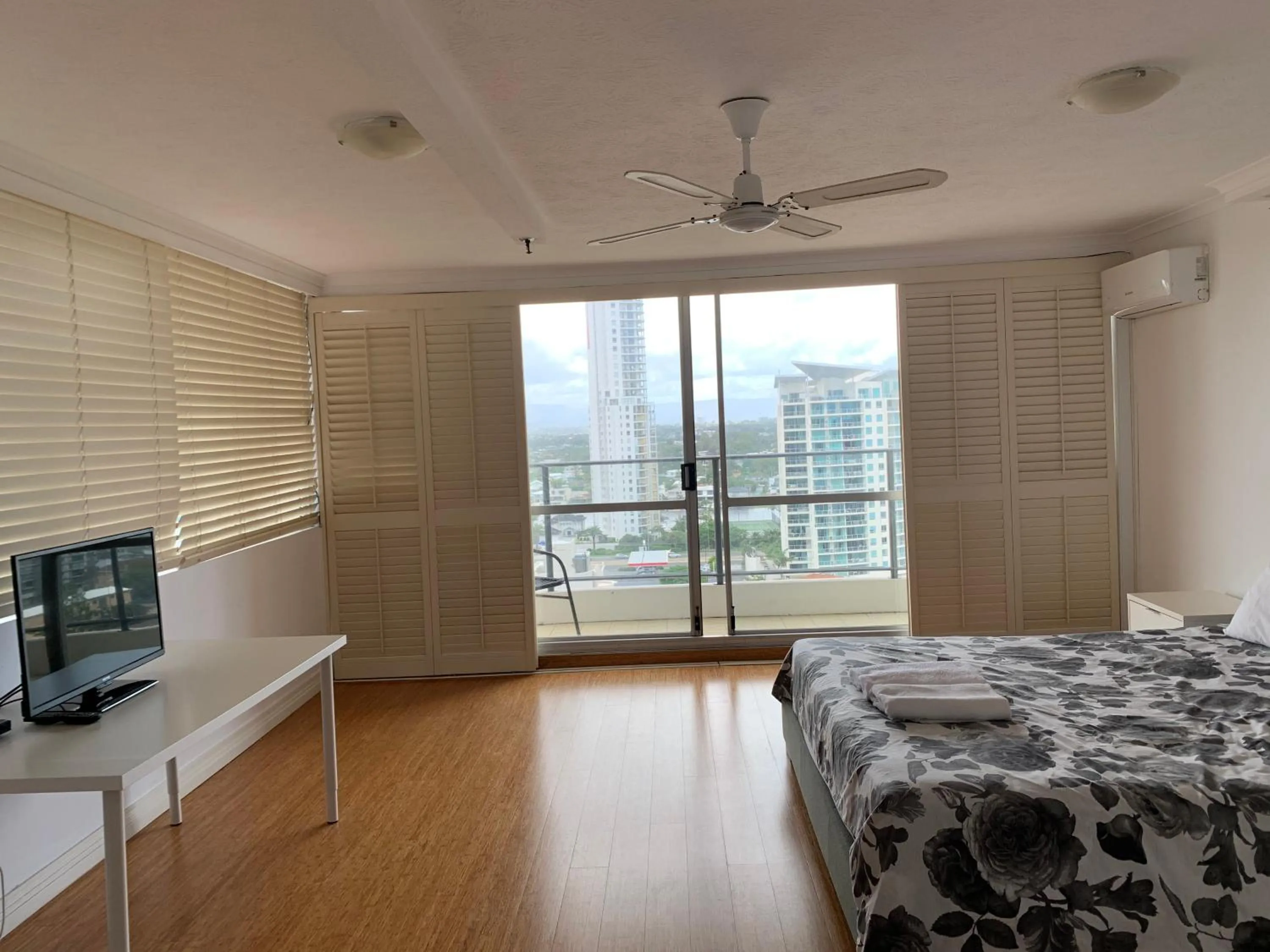 Bed in The Penthouses Apartments