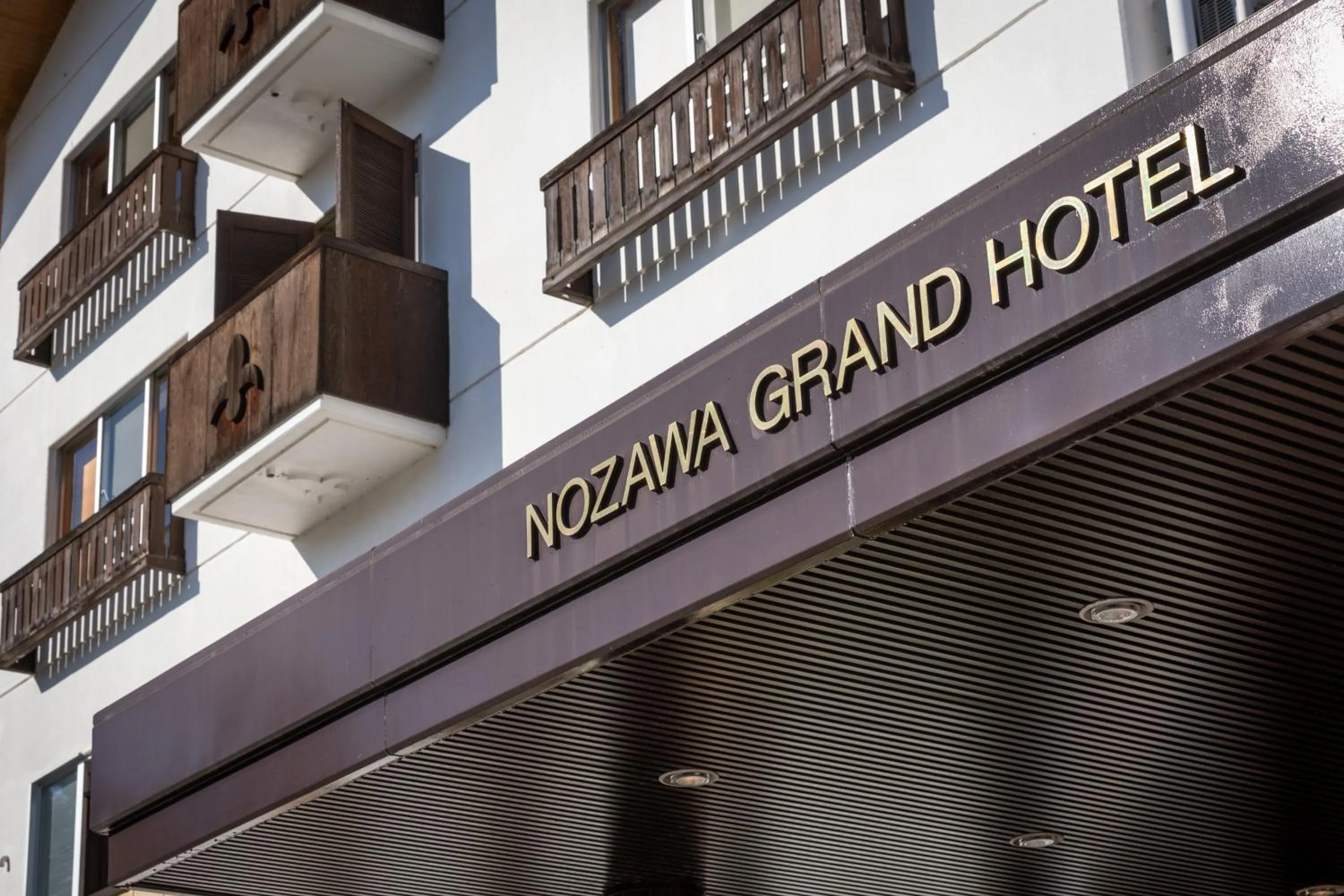 Property logo or sign in Nozawa Grand Hotel