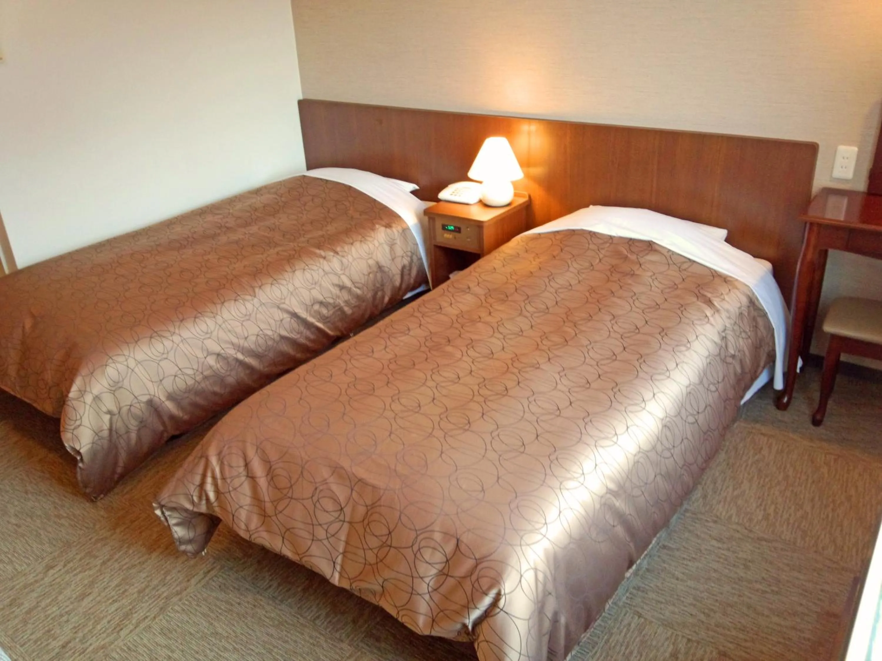 Bed in Hakuba Highland Hotel