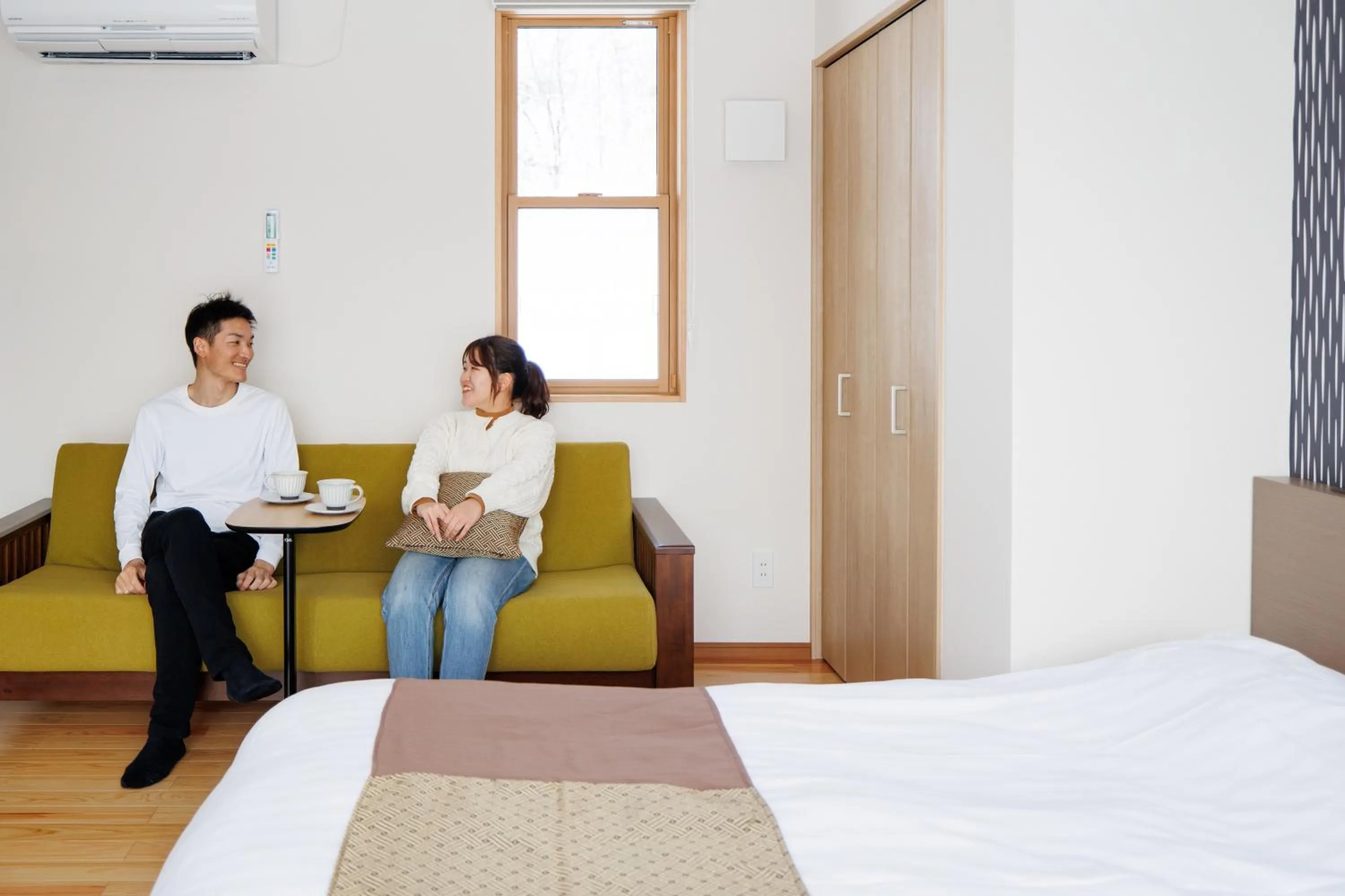 Living room, Bed in Hakuba Highland Hotel
