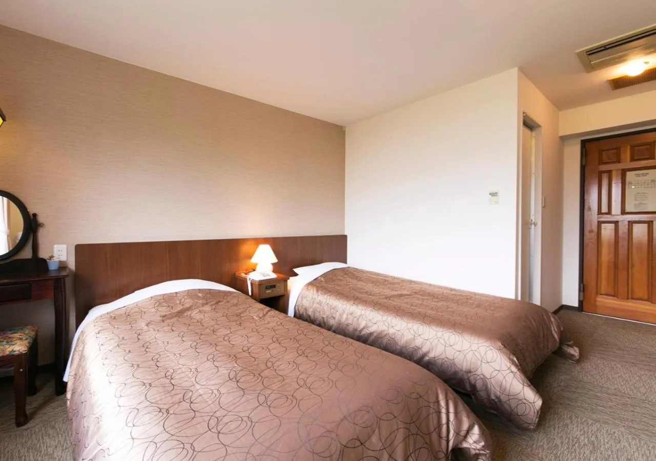 Bed in Hakuba Highland Hotel