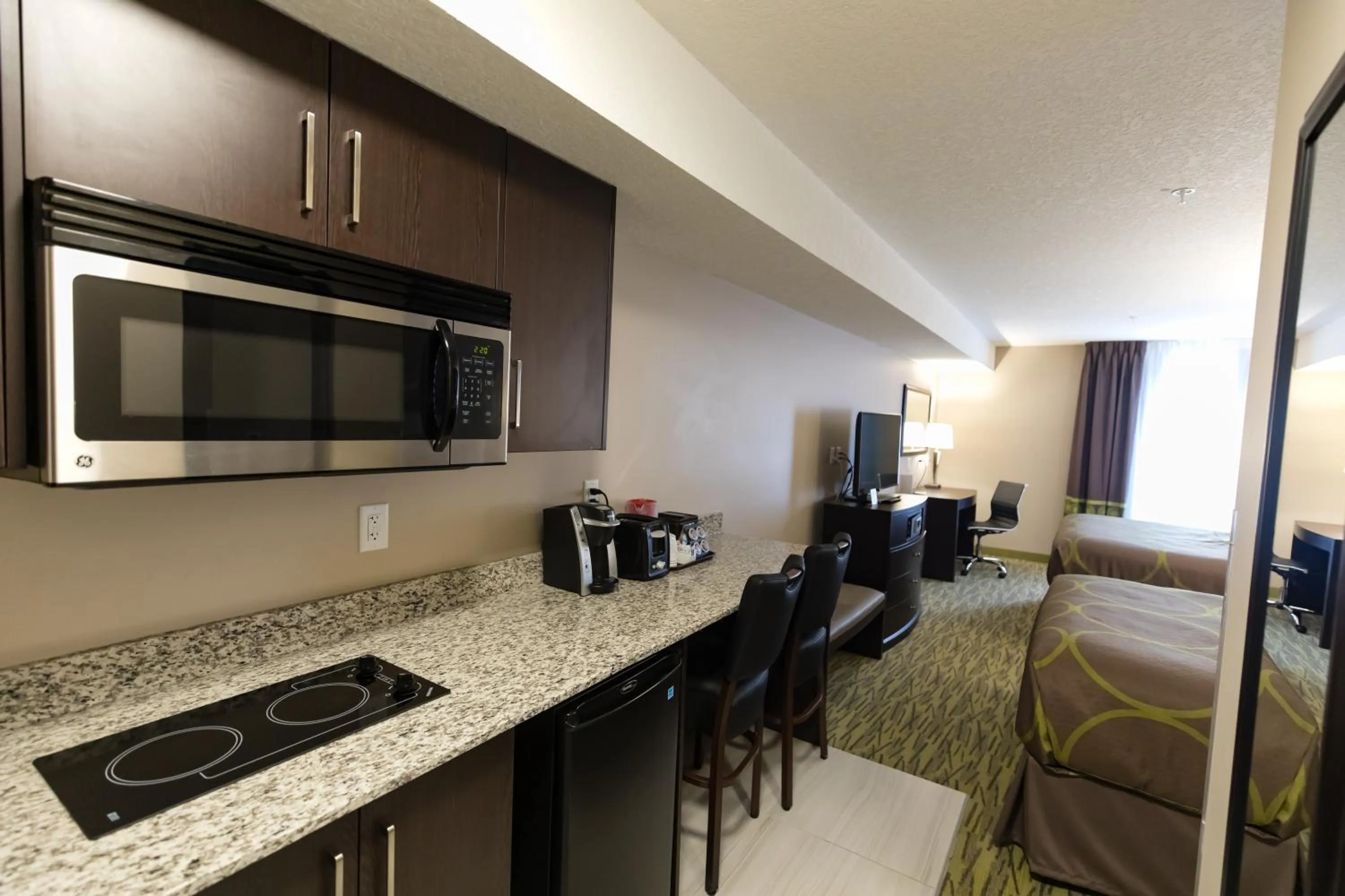 Kitchen or kitchenette in Super 8 by Wyndham Canmore