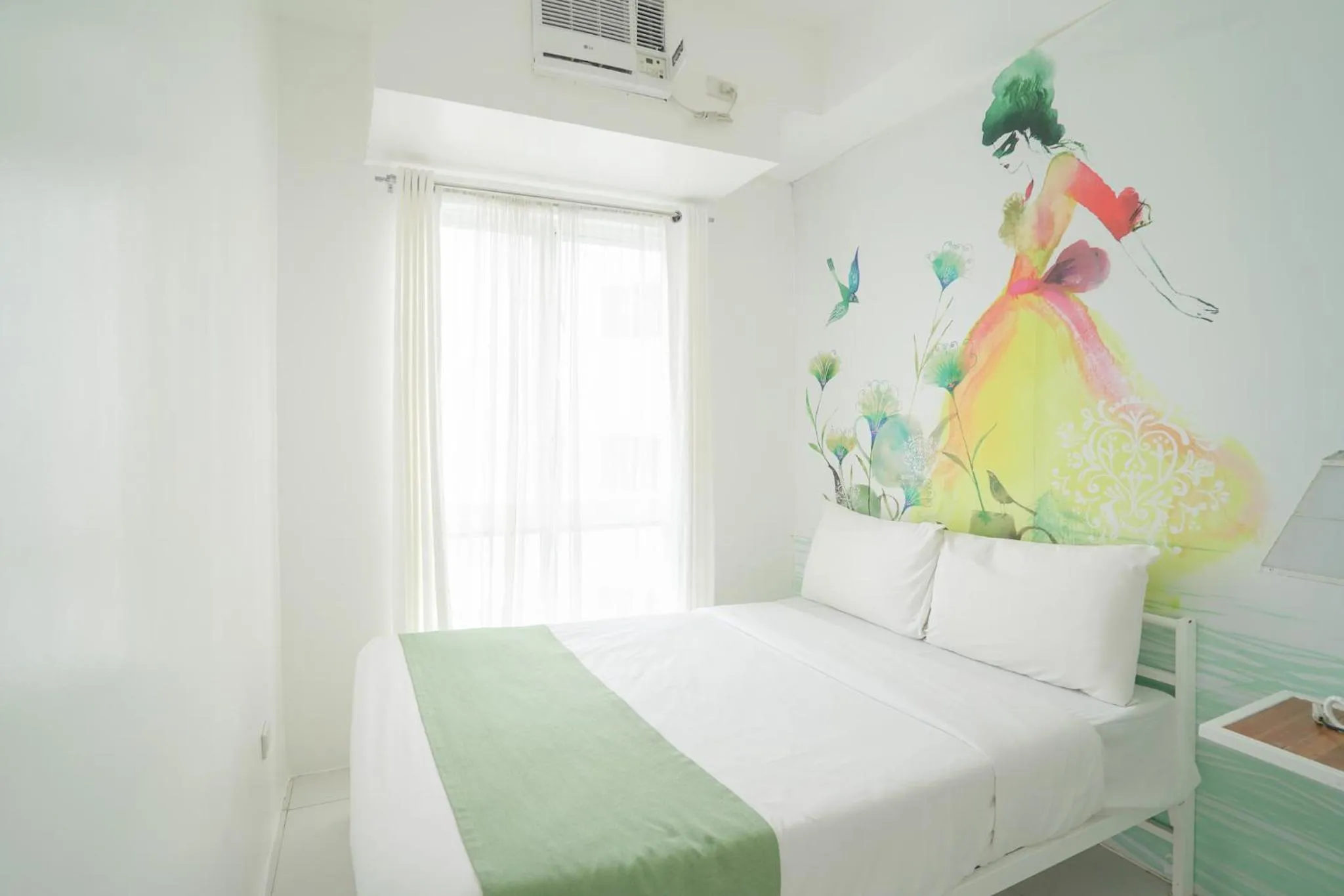 Bed in La Bella Boutique Hotel