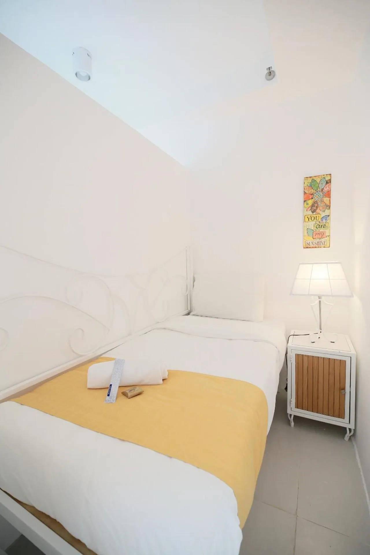 Bed in La Bella Boutique Hotel