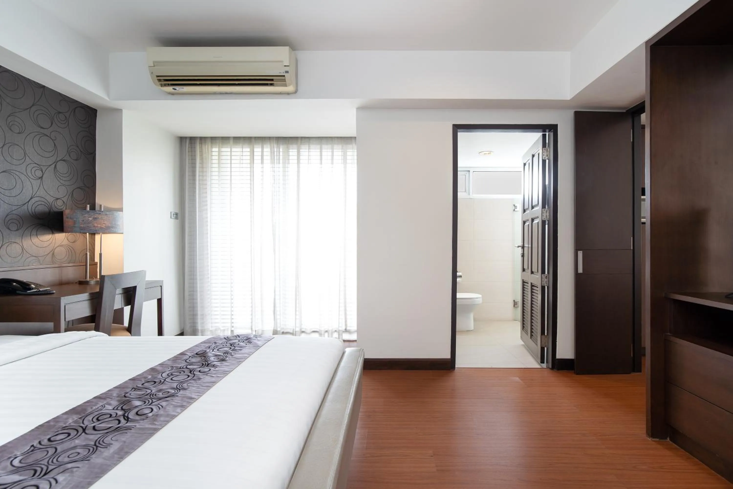 Bed in Lily Hotel Bangkok