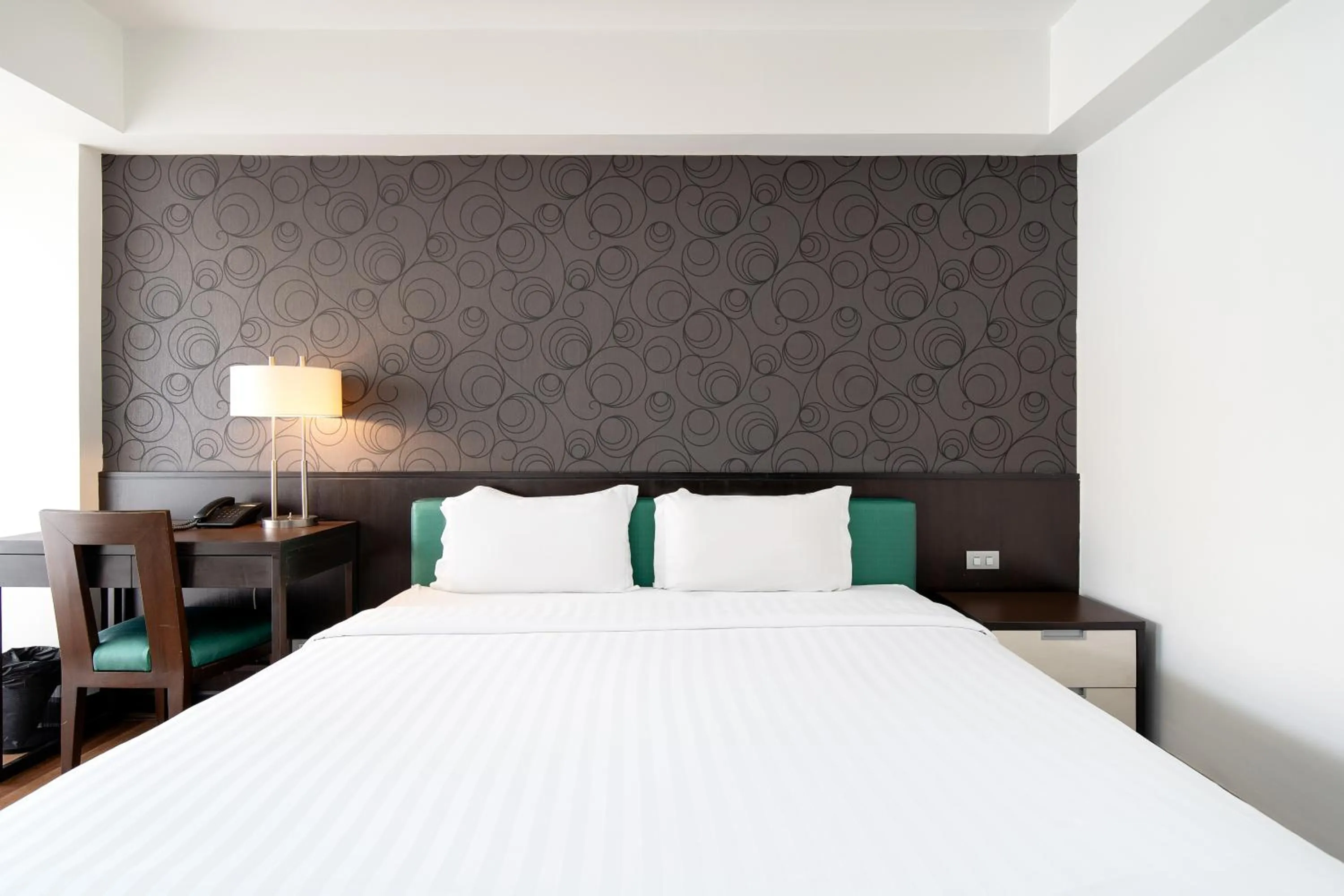 Bed in Lily Hotel Bangkok