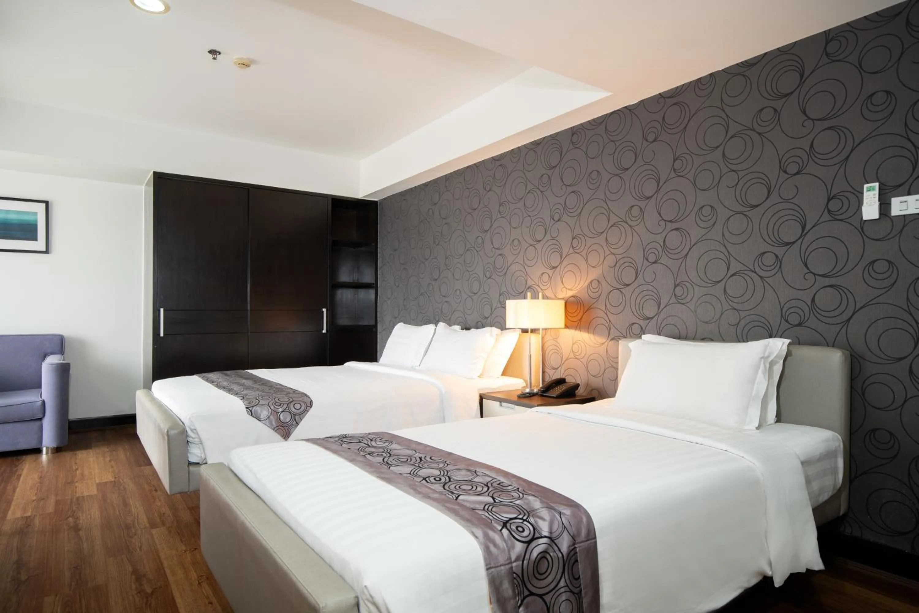 Bed in Lily Hotel Bangkok