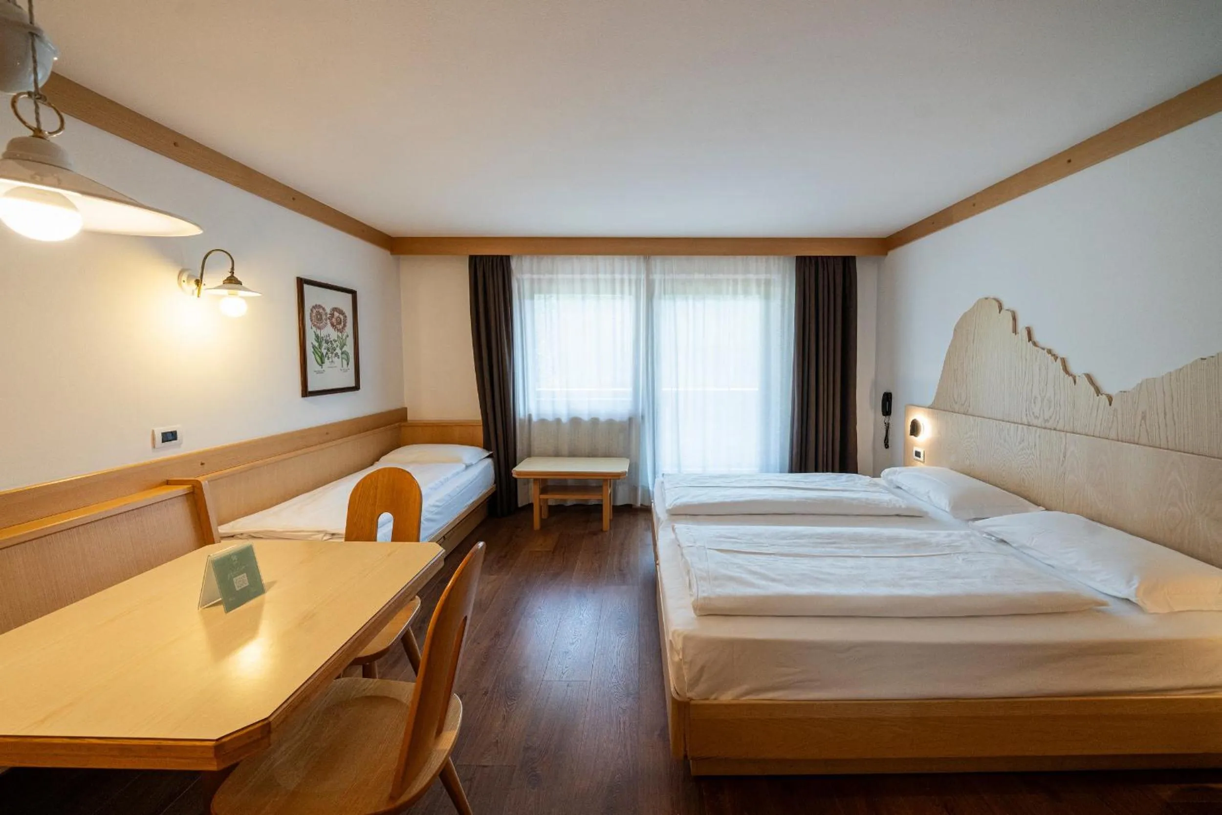 Bed in Apartments Boè