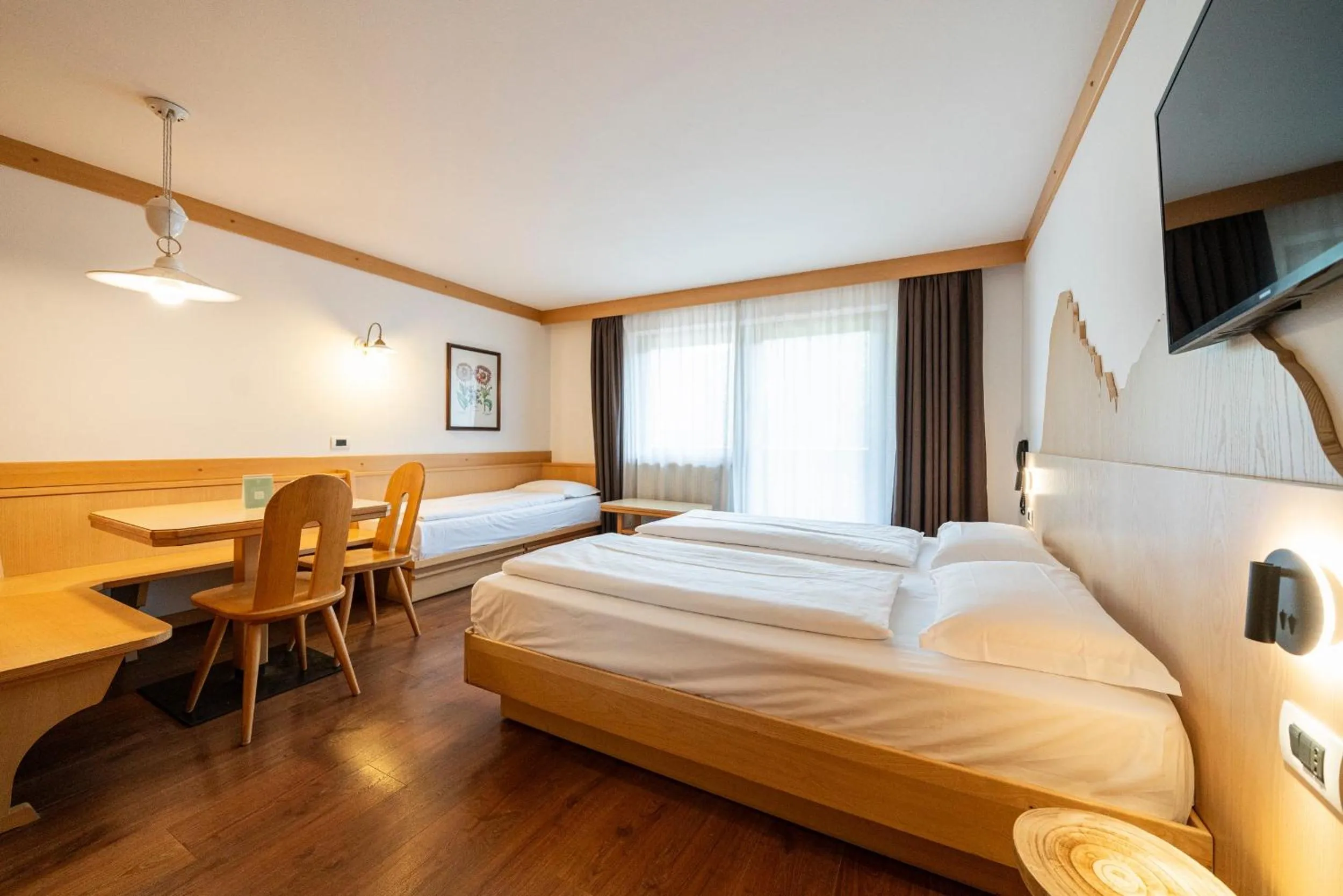 Bed in Apartments Boè