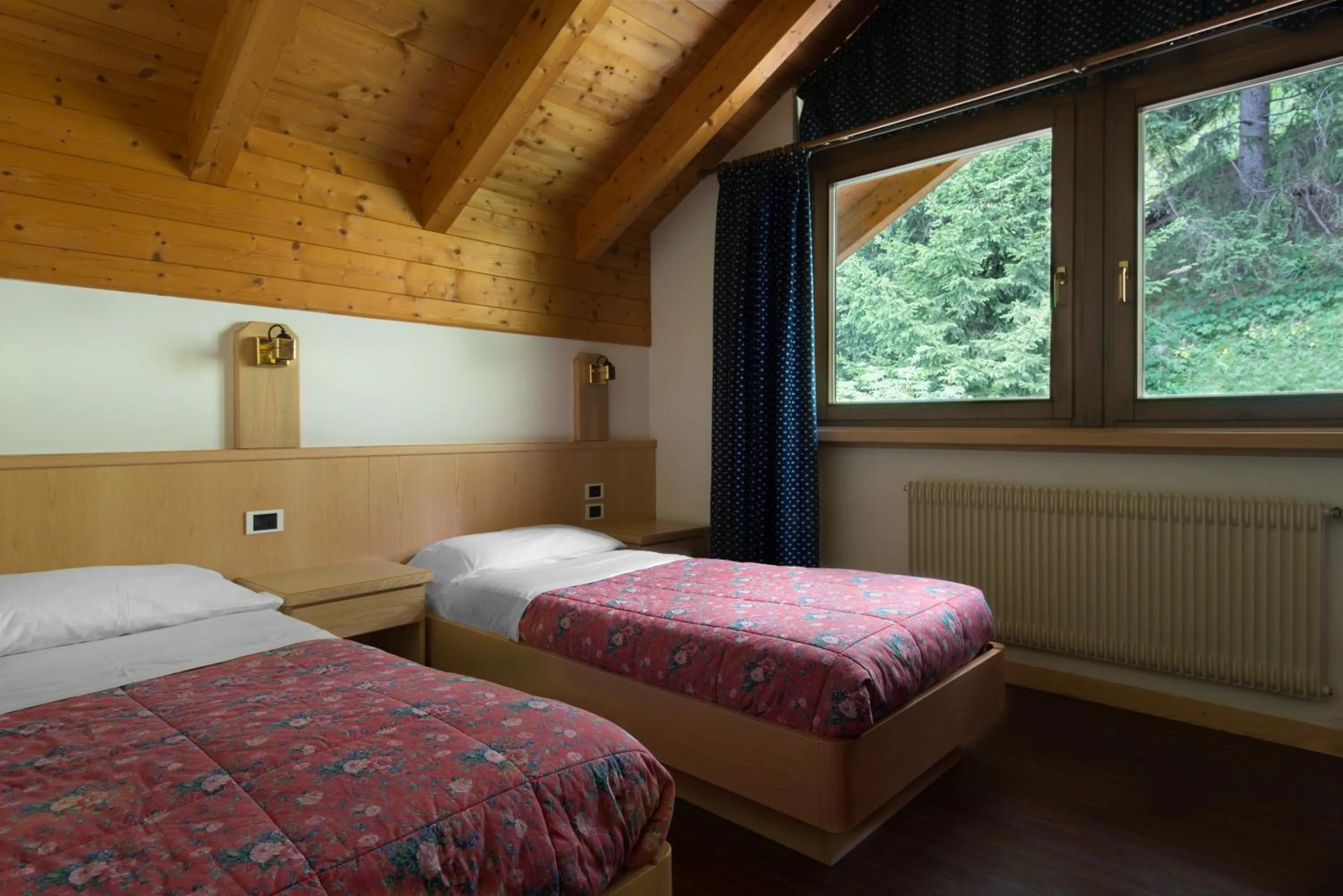 Bed in Apartments Boè