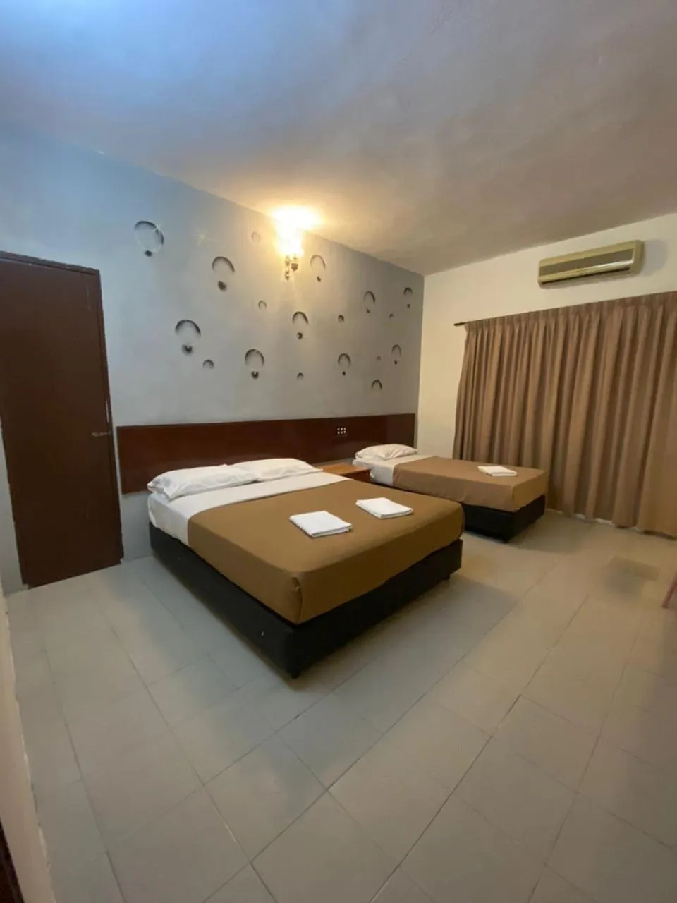 Bed in Pangkor Bay View Beach Resort