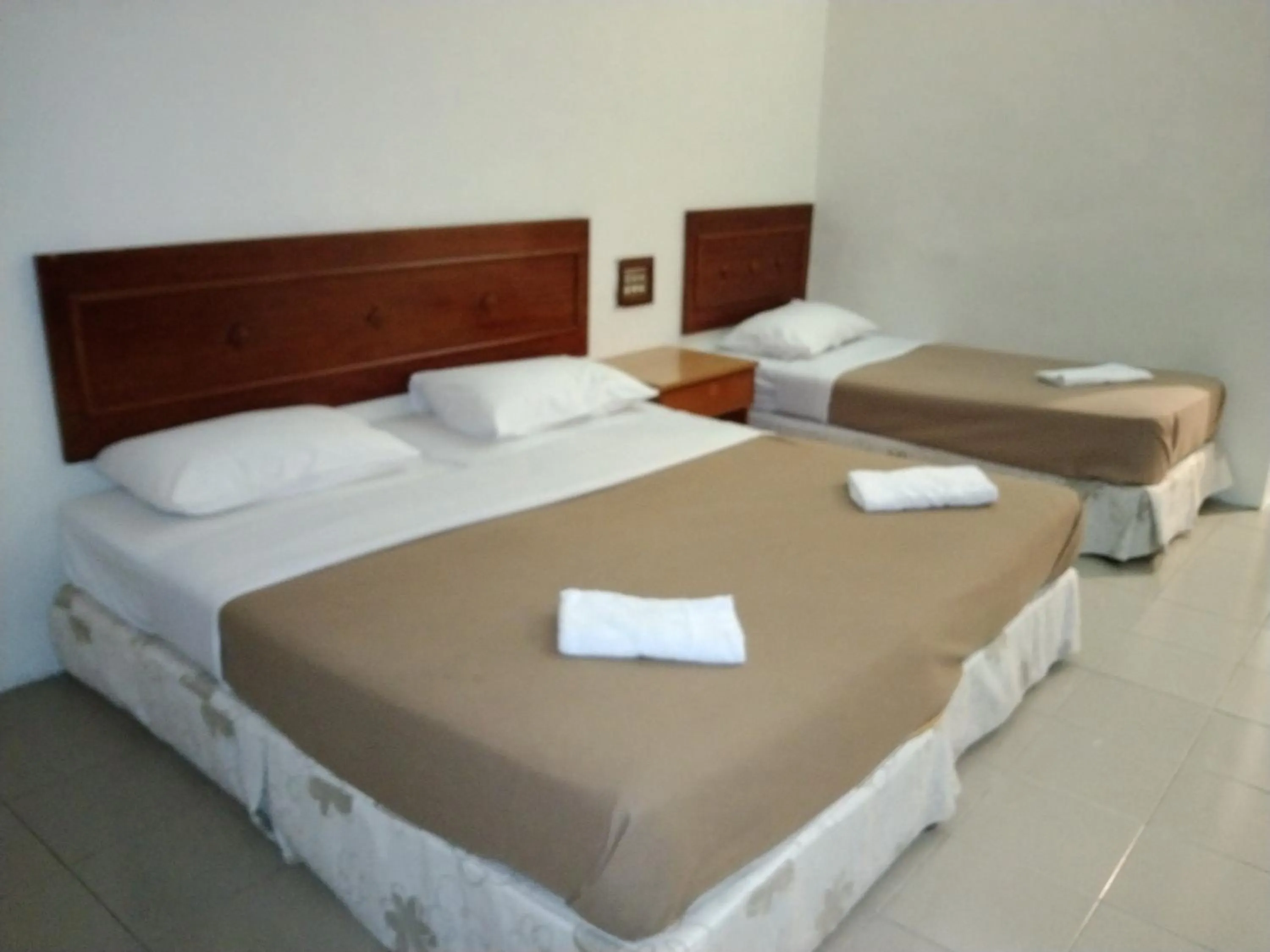 Bed in Pangkor Bay View Beach Resort