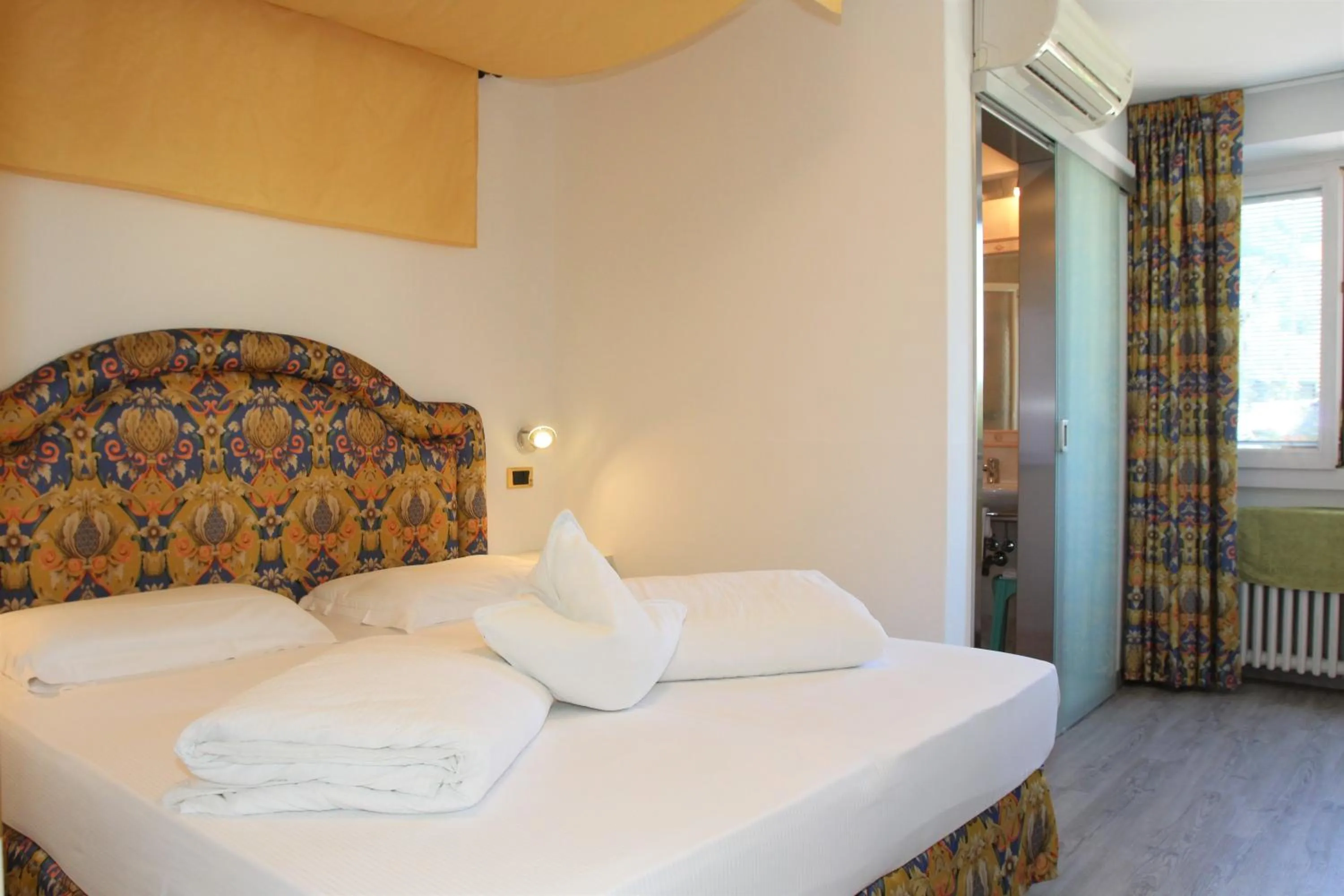 Bed in Hotel Augusta