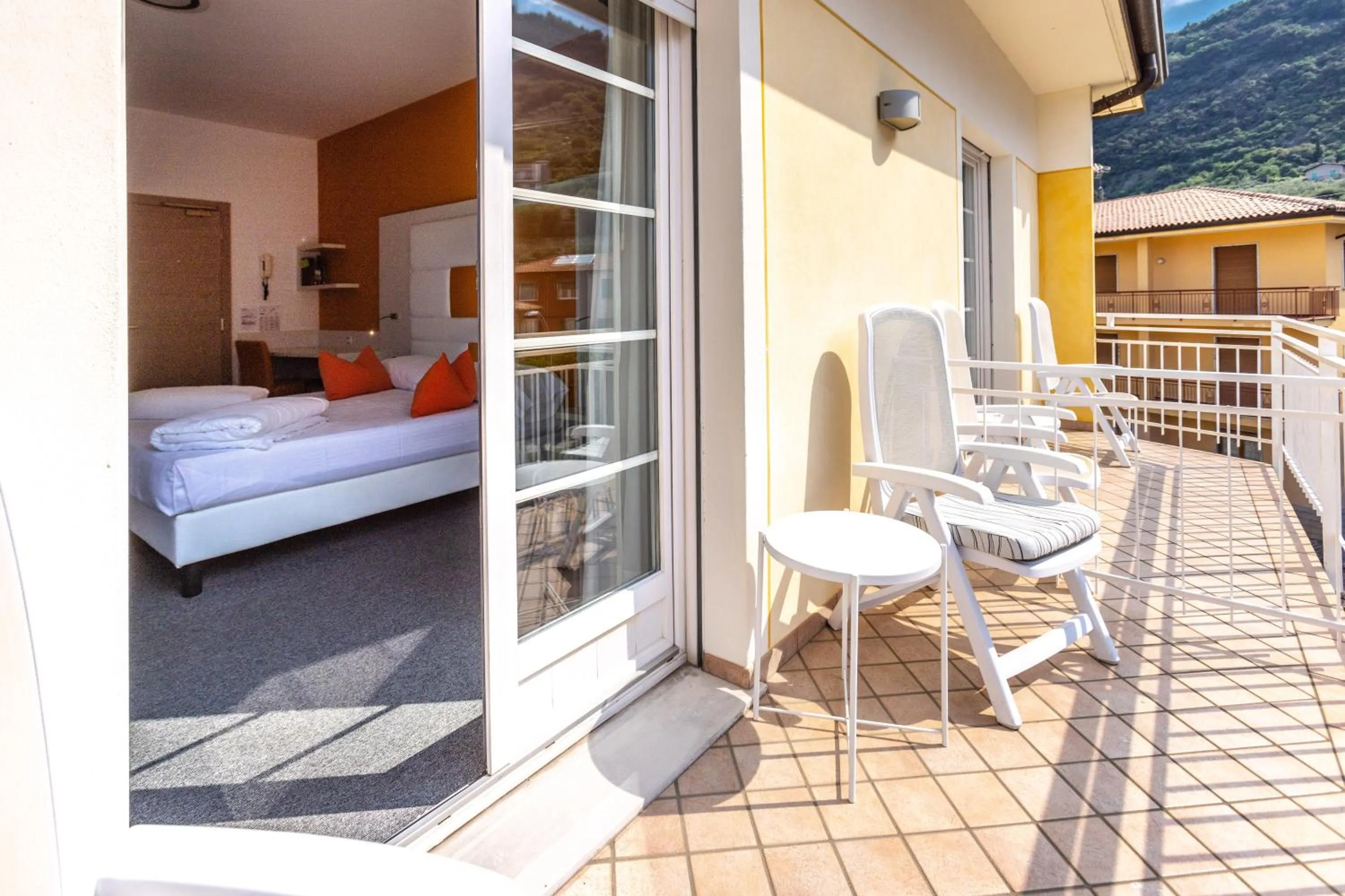 Balcony/Terrace, Bed in Hotel Augusta