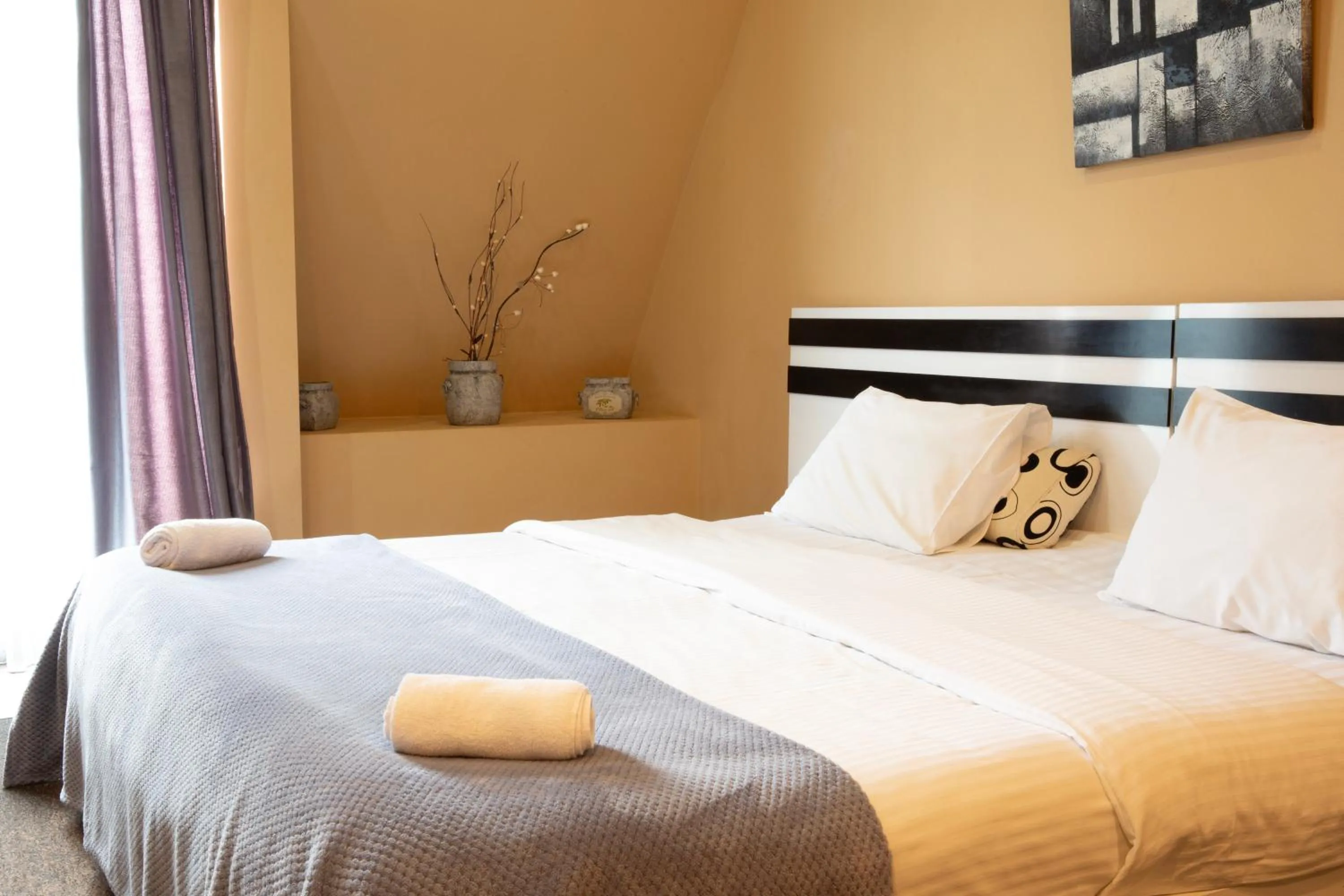 Bed in Hotel Diplomat