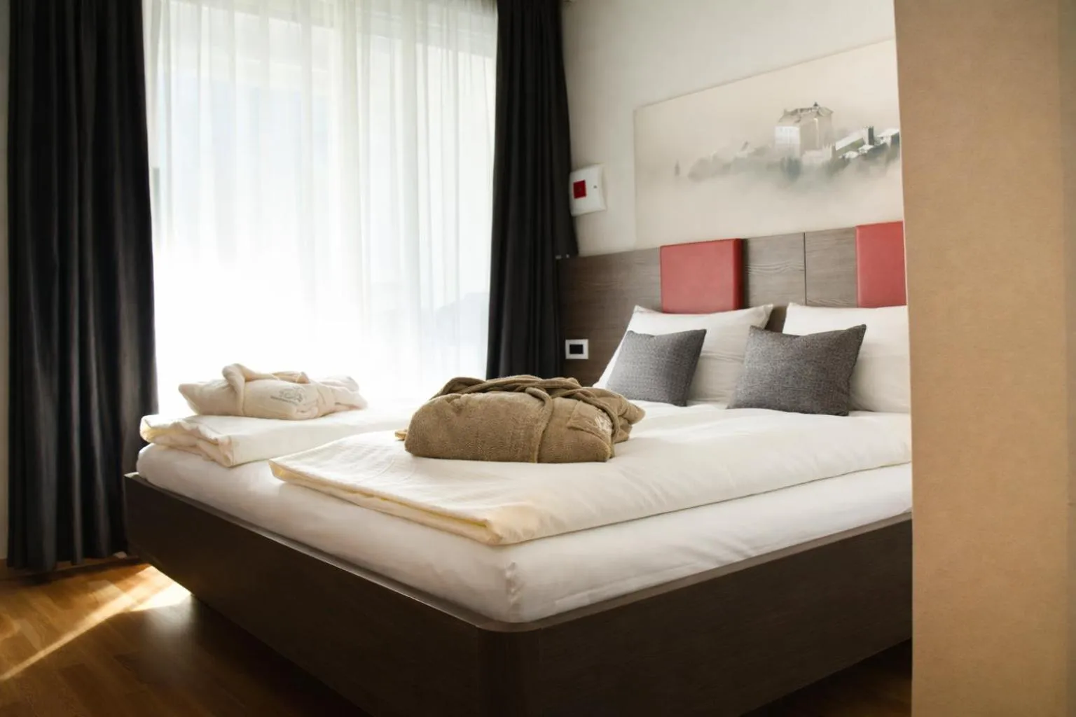 Bed in Hotel Comfort Erica Dolomiti Val d'Adige