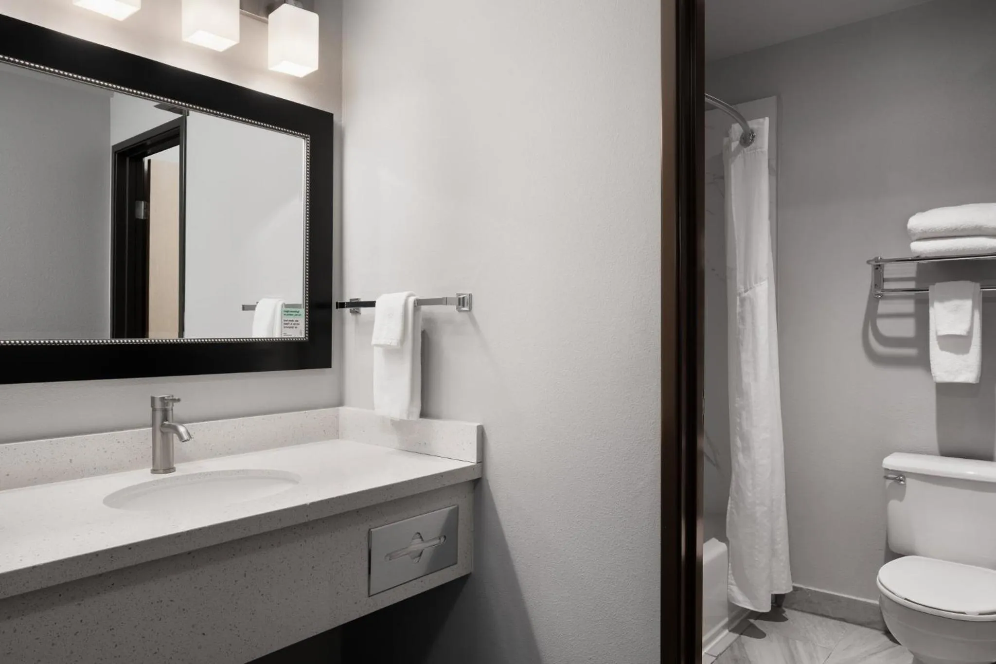 Bathroom in Garner Hotel Auburn - Seattle by IHG