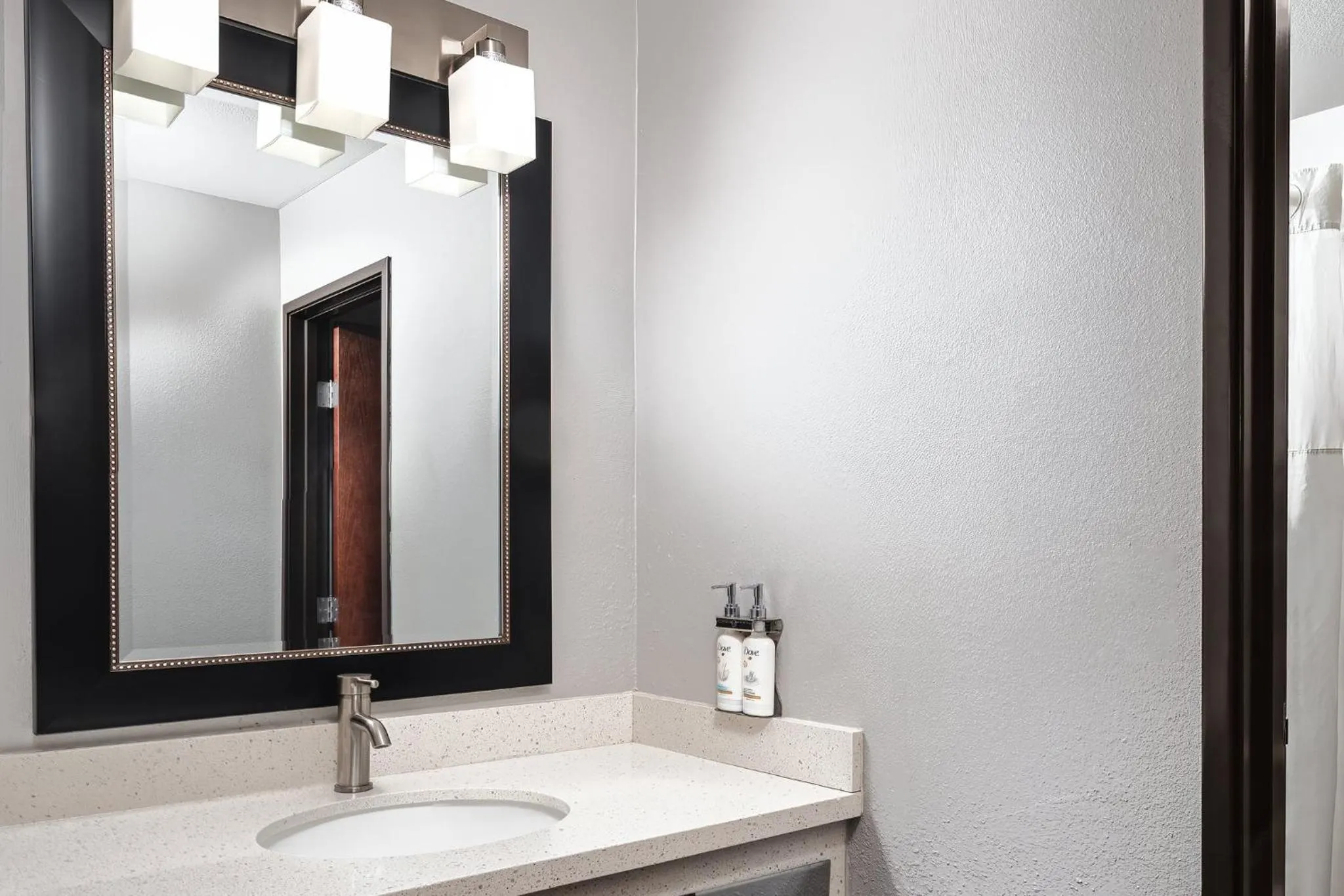 Bathroom in Garner Hotel Auburn - Seattle by IHG