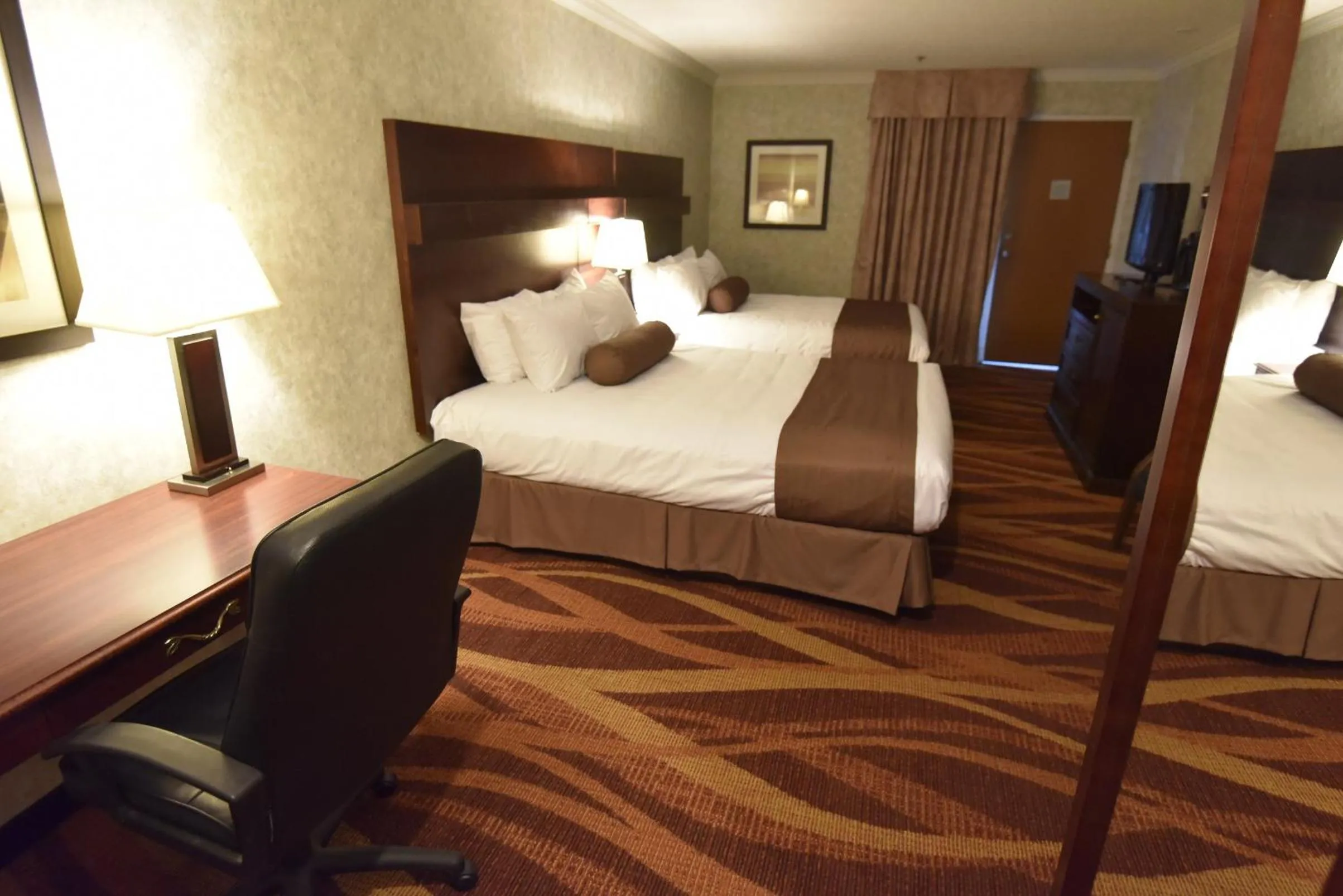 Bed in Tropical Inn - North Battleford