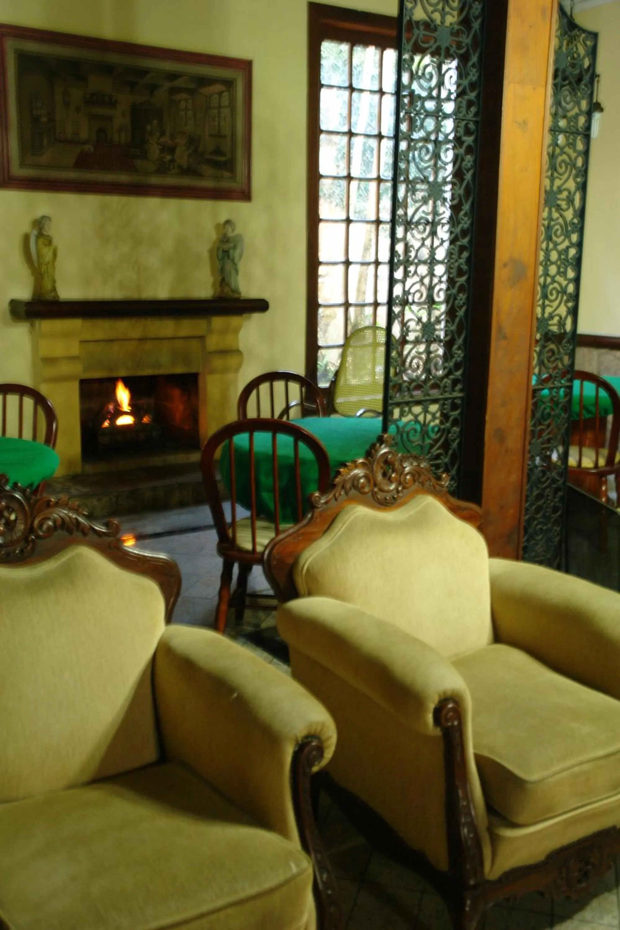 Communal lounge/ TV room in Hotel Lopes Caxambu