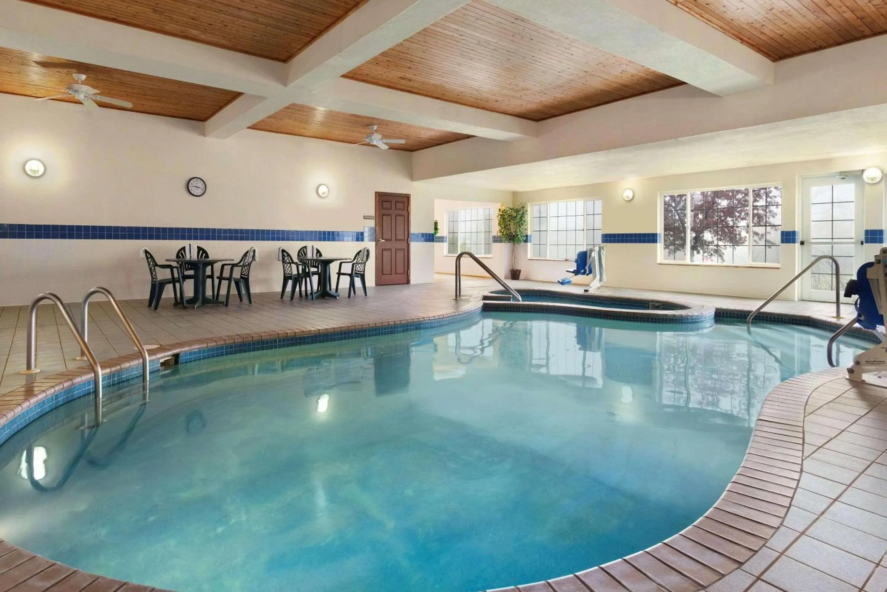 Swimming pool in Country Inn & Suites by Radisson, West Bend, WI