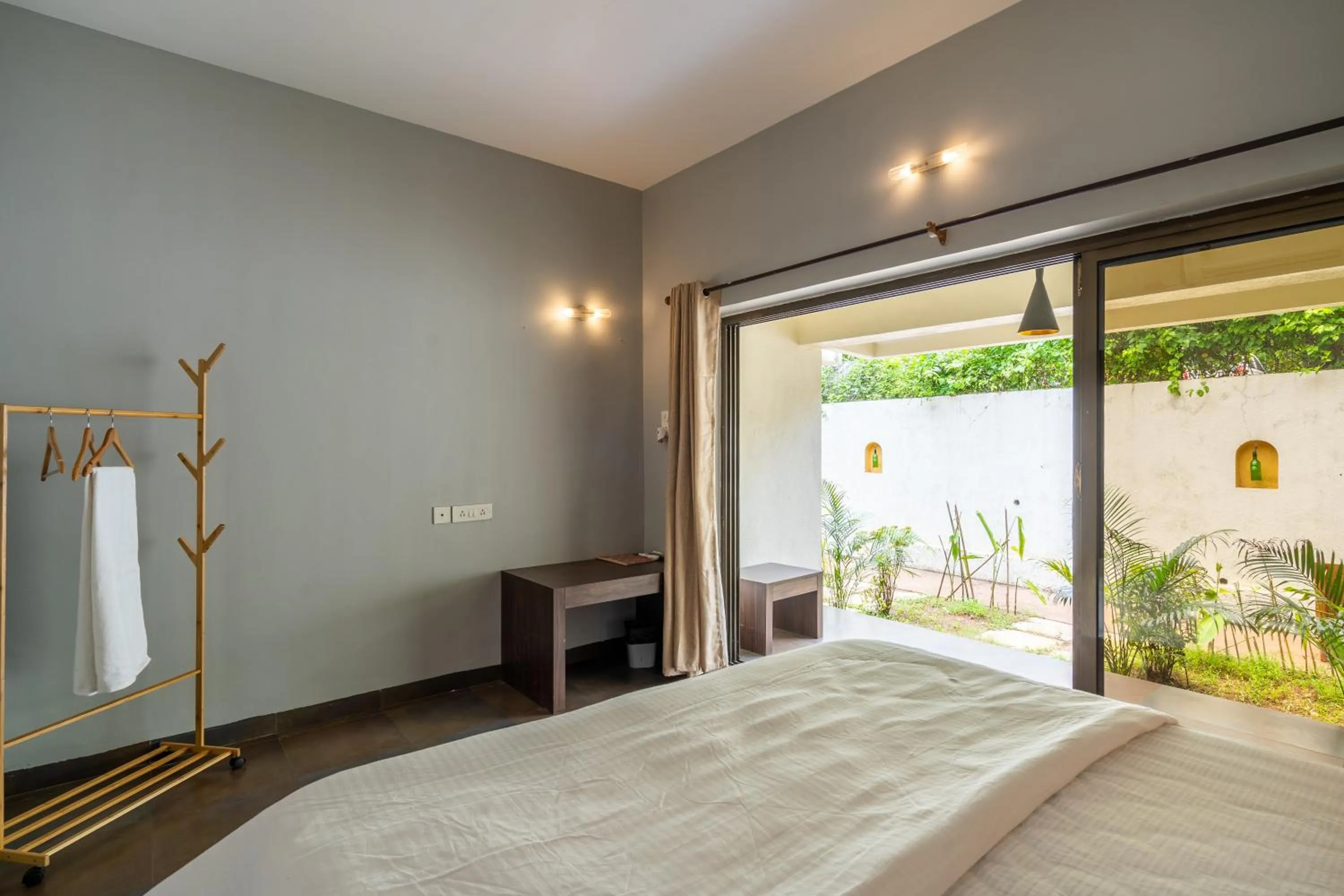 Photo of the whole room, Bed in The Banyan Soul