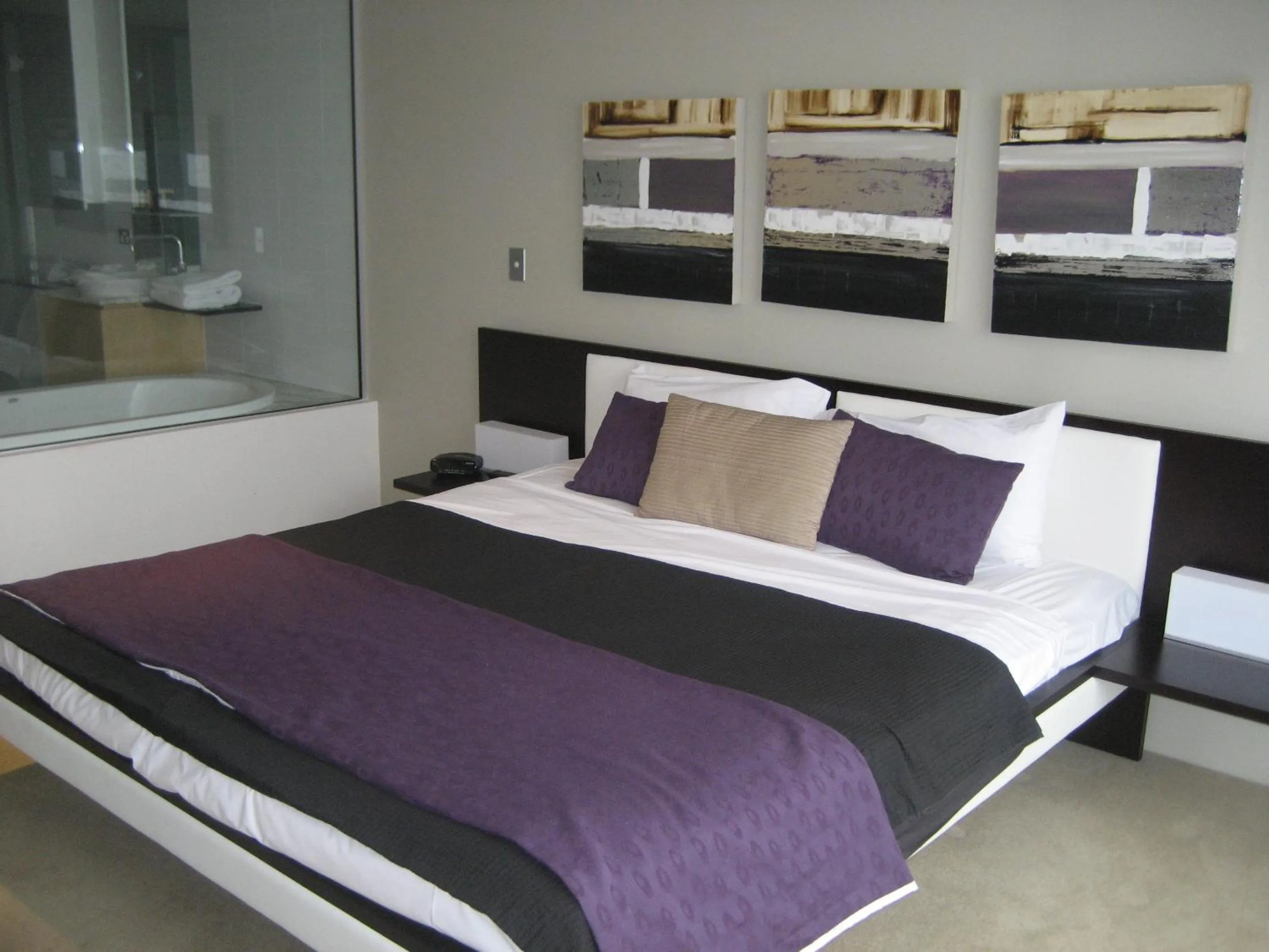 Bed in Aria Apartments