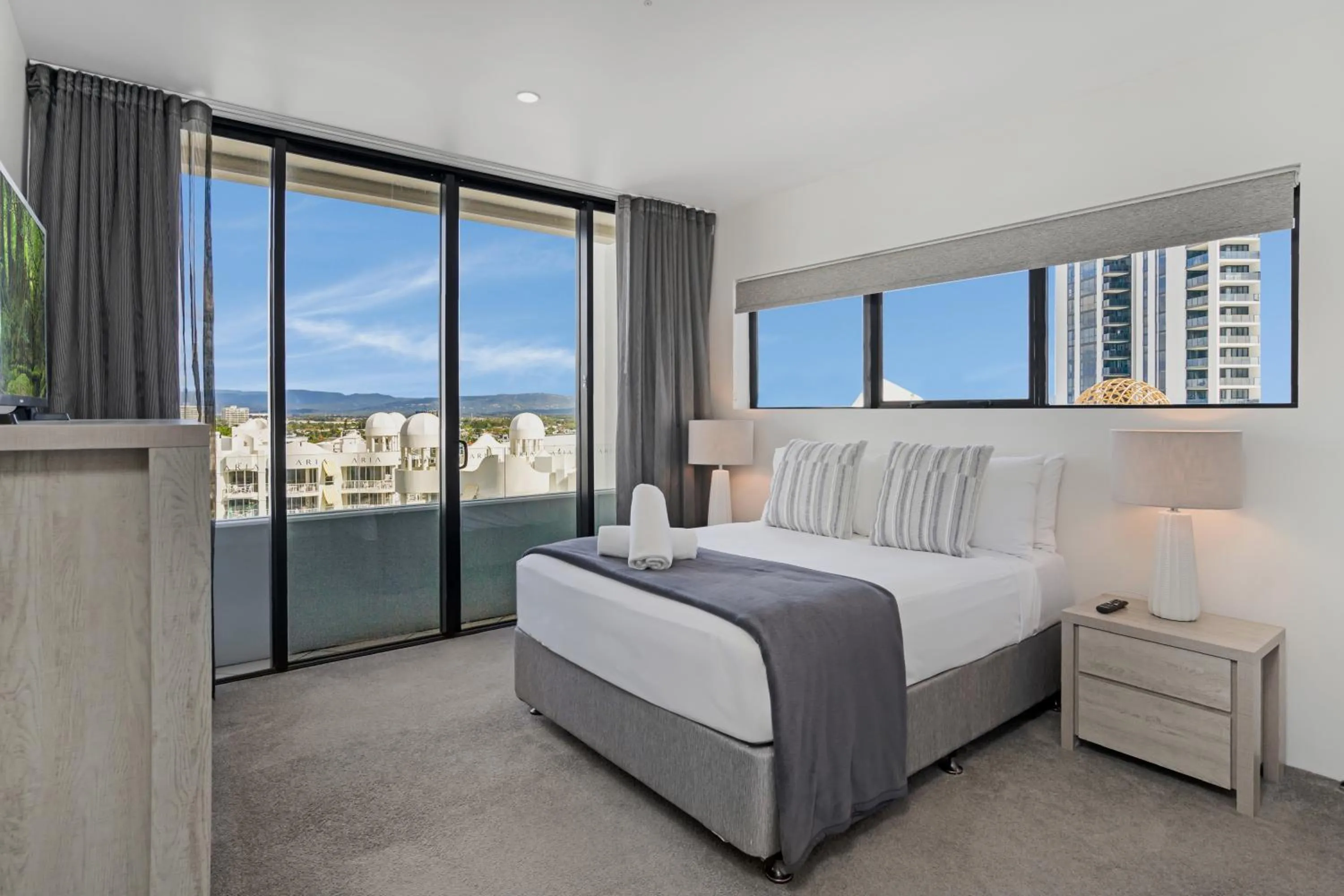 Bed in Aria Apartments