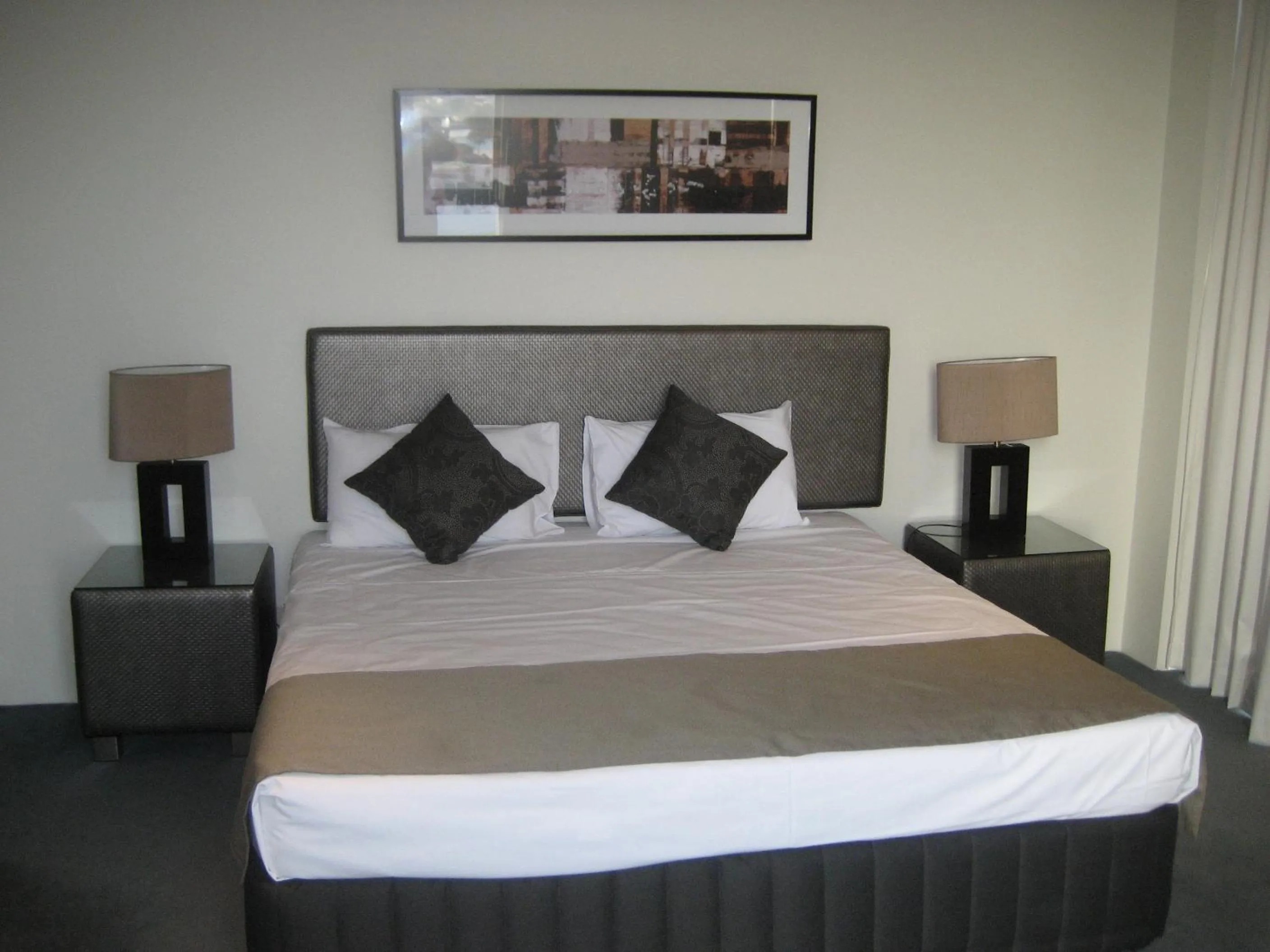 Bed in Aria Apartments