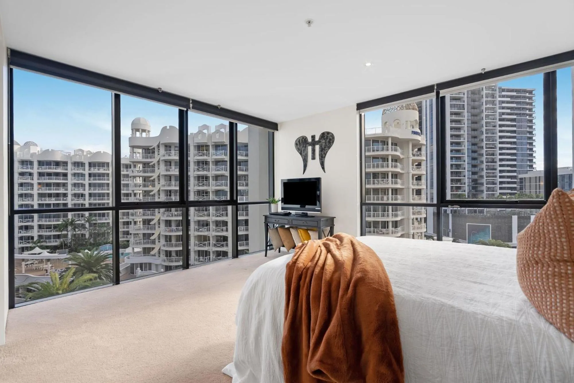 Bed in Aria Apartments