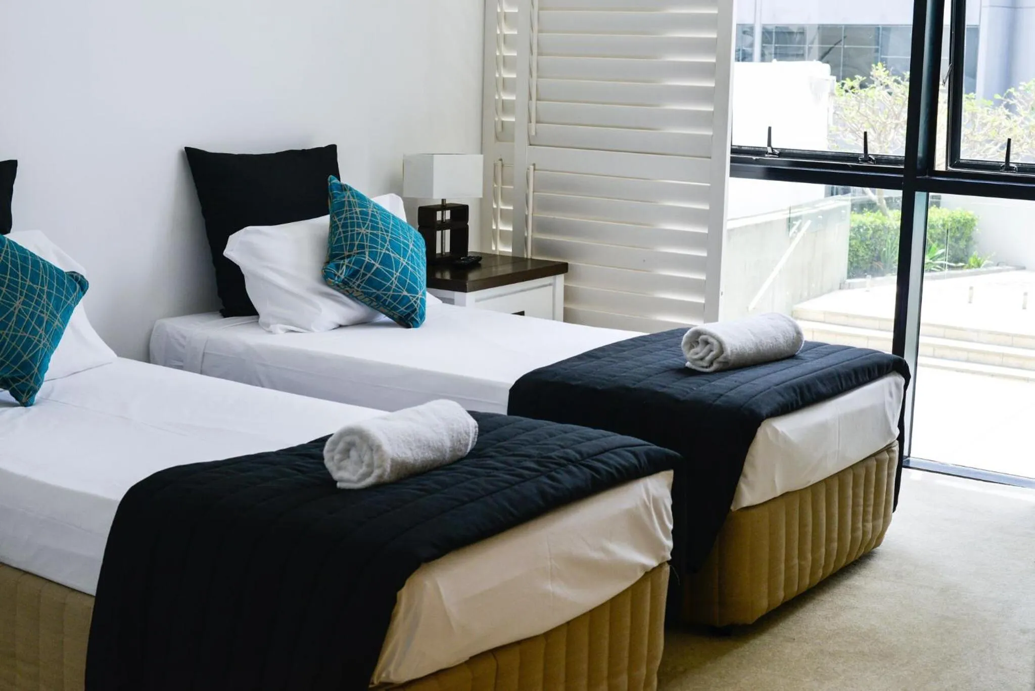 Bed in Aria Apartments