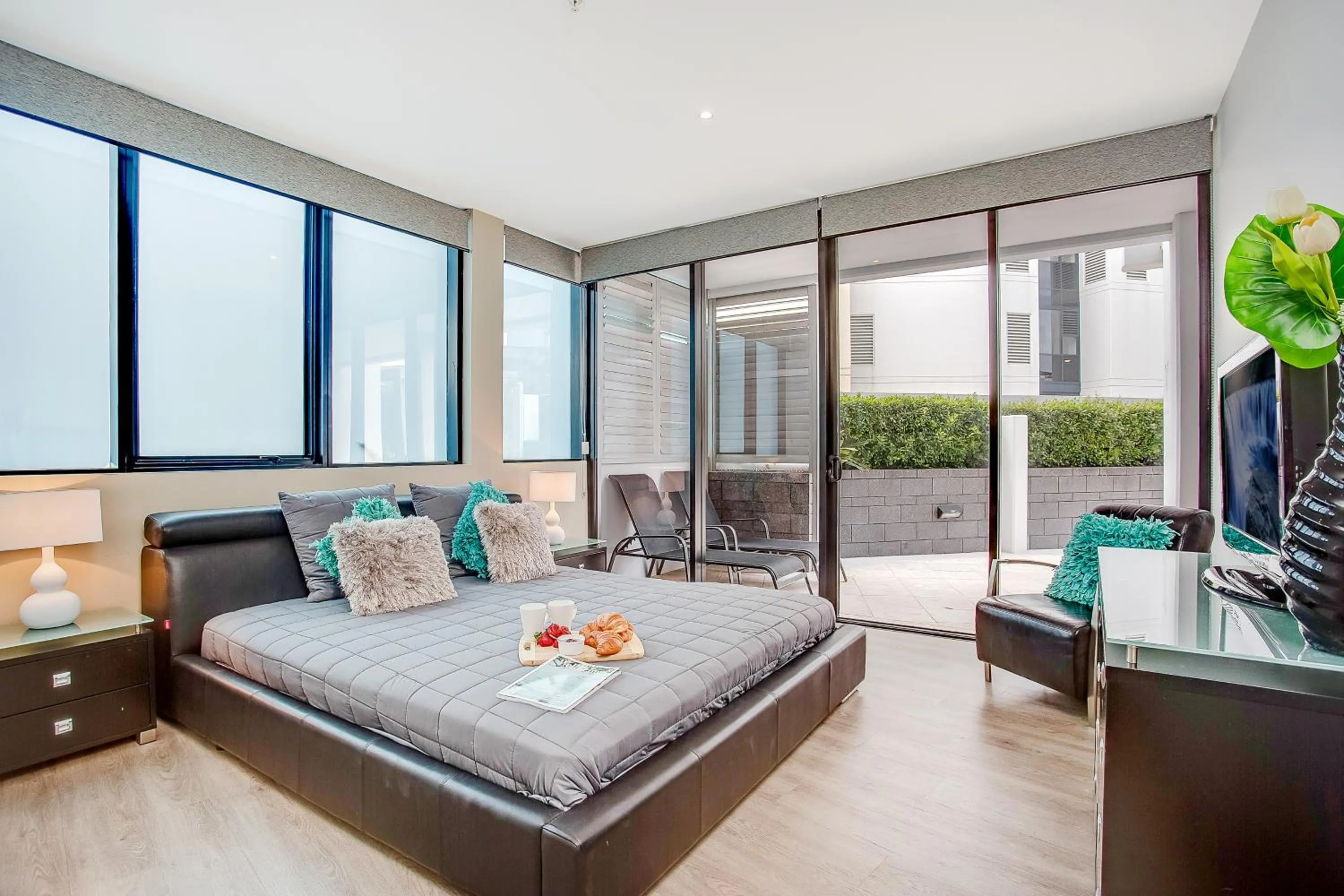 Bed in Aria Apartments