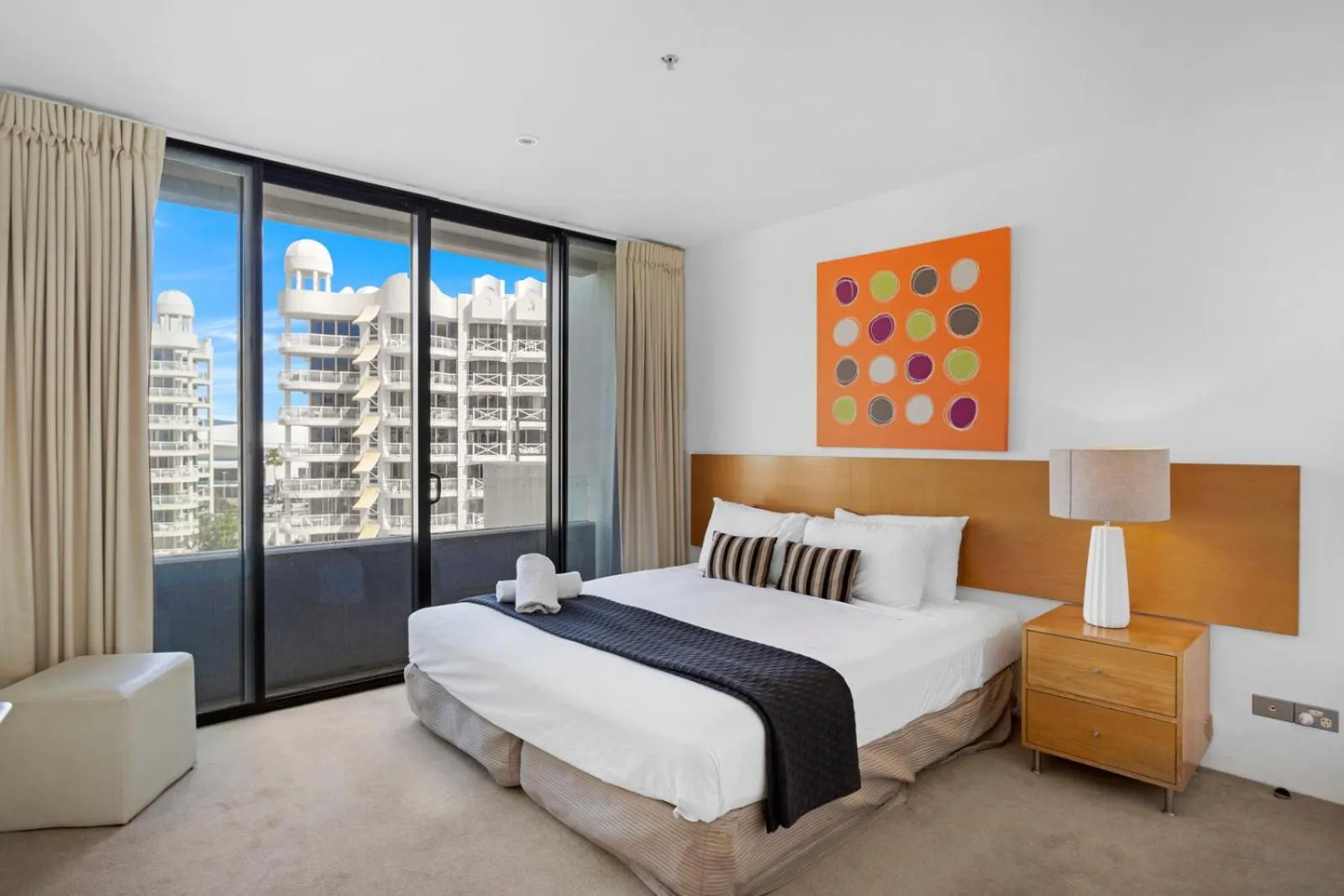 Bed in Aria Apartments