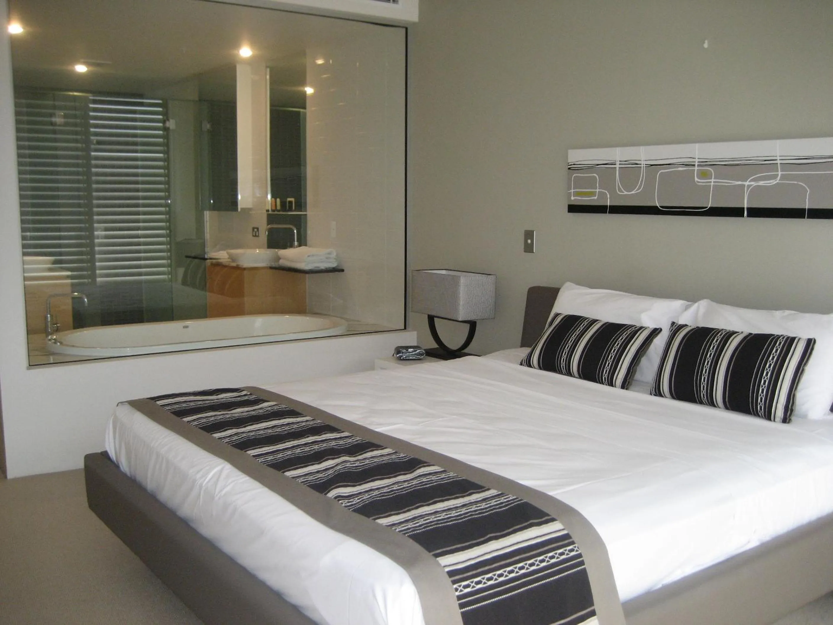 Bed in Aria Apartments