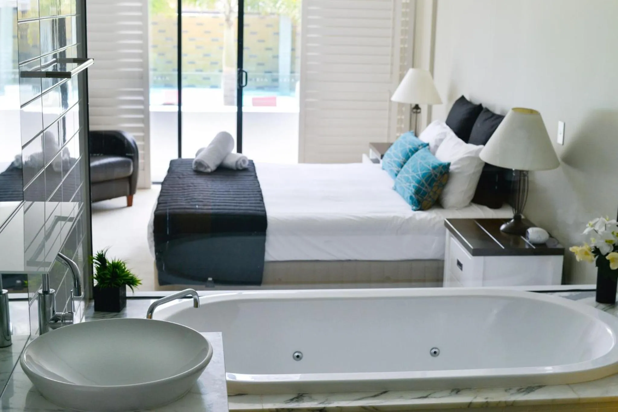 Bed in Aria Apartments