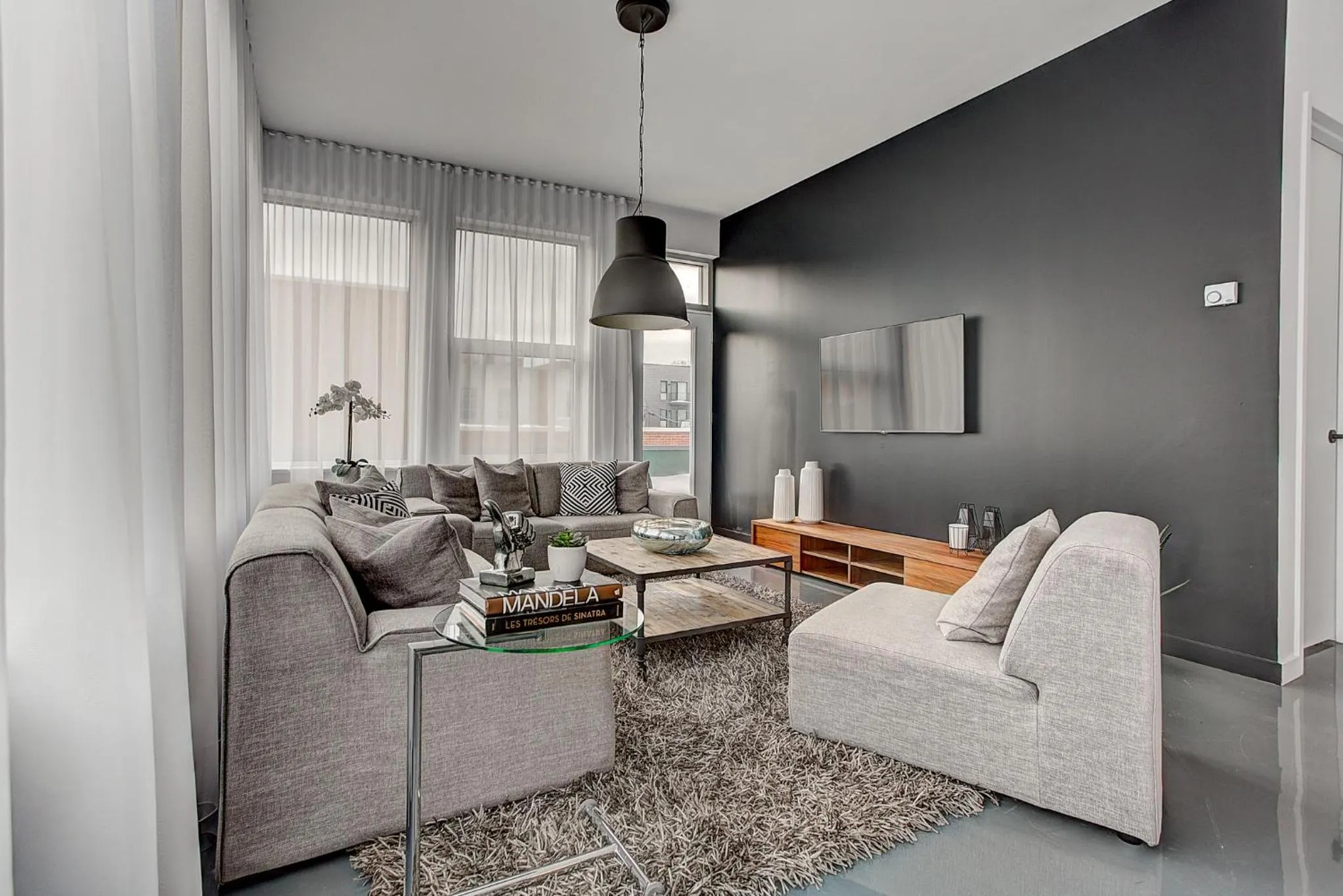 Living room in Les Lofts du Centre by Simplissimmo