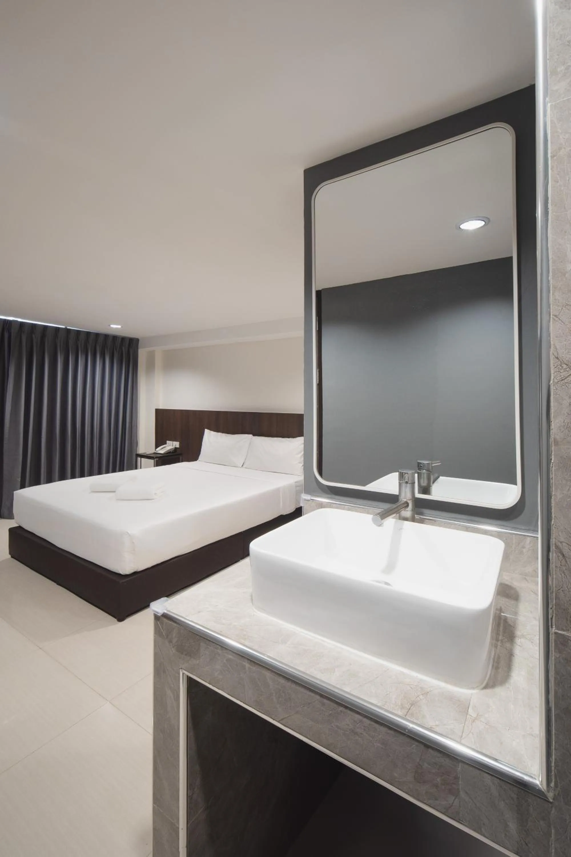 Bed in Grand Alpine Hotel