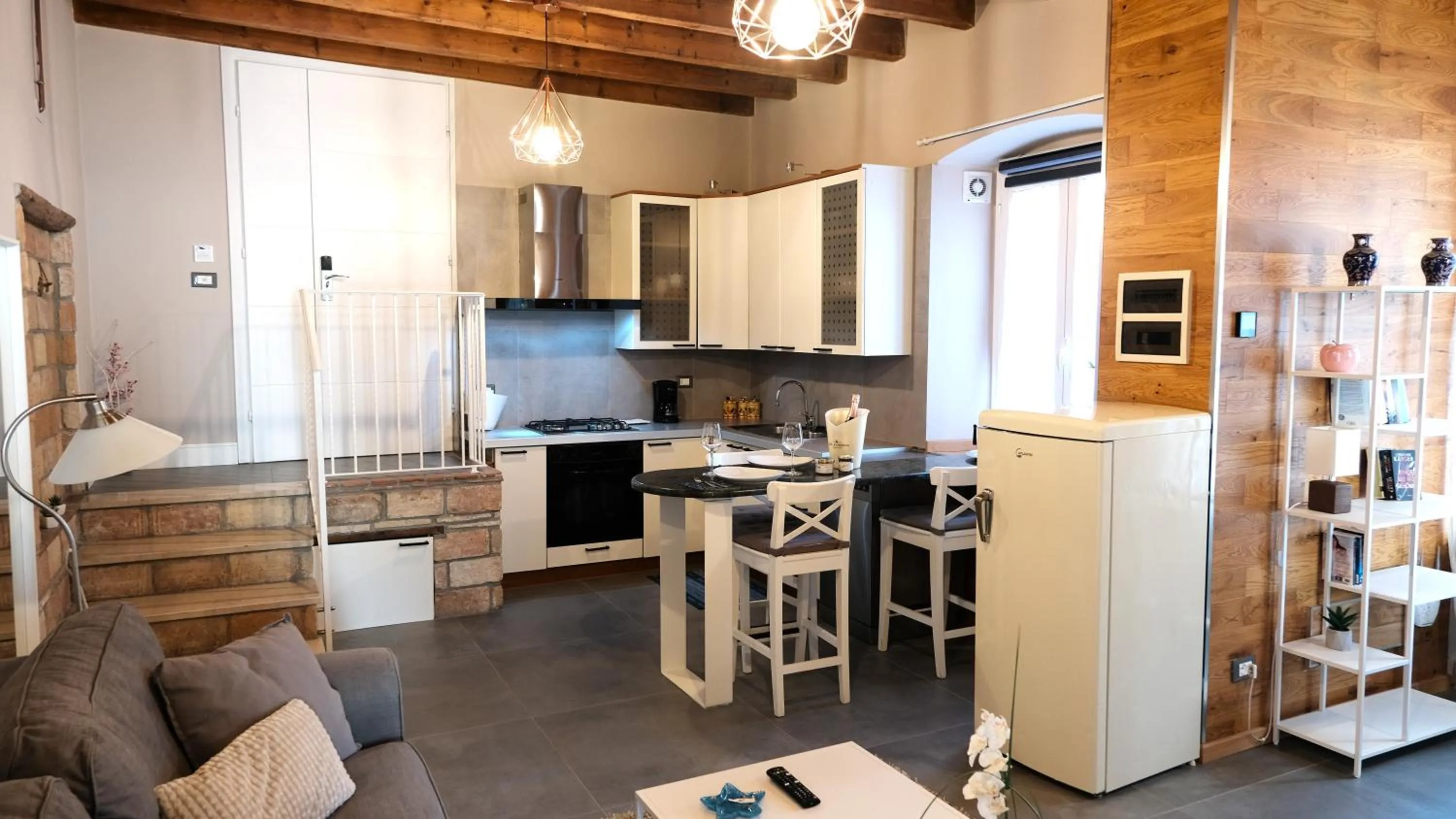 Kitchen or kitchenette in Antiche Rive Holidays Apartments