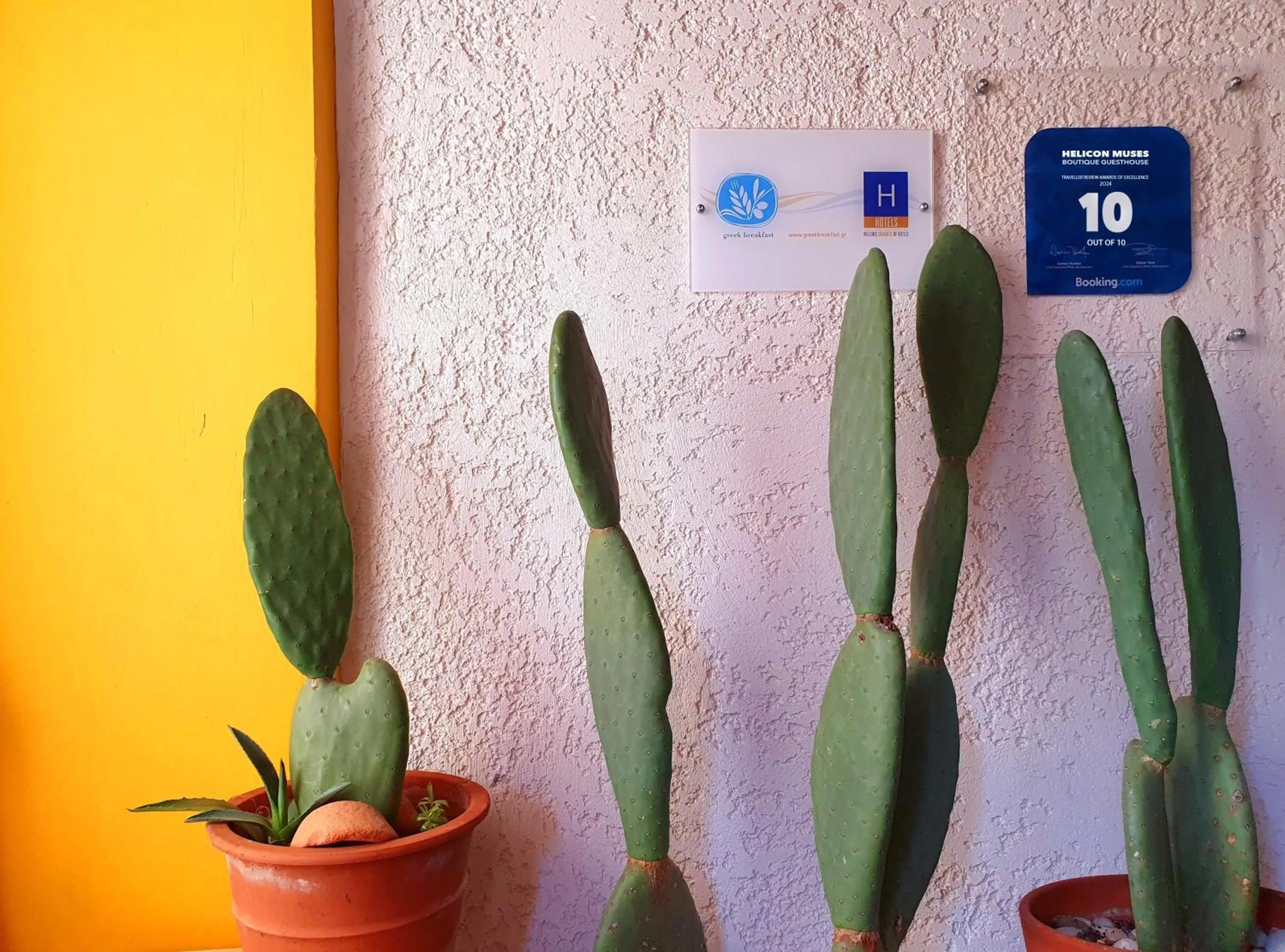 Property logo or sign in Helicon Muses Friendly Mountain B&B Guesthouse