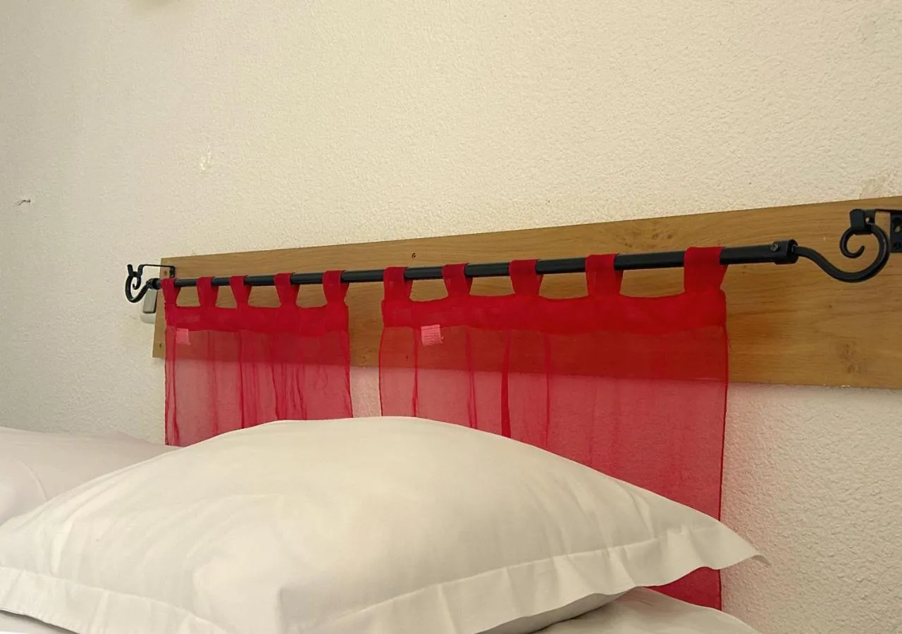 Bed in Hôtel Le Carnon